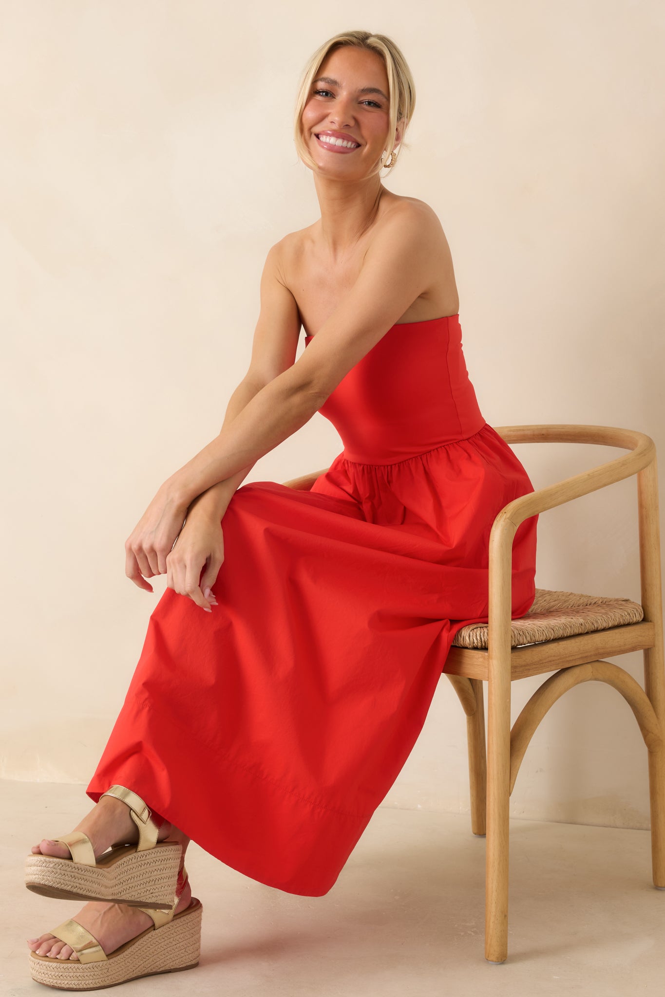 Full-length look showcasing the contrast between the smooth, body-hugging bodice and the airy skirt with side seam pockets.