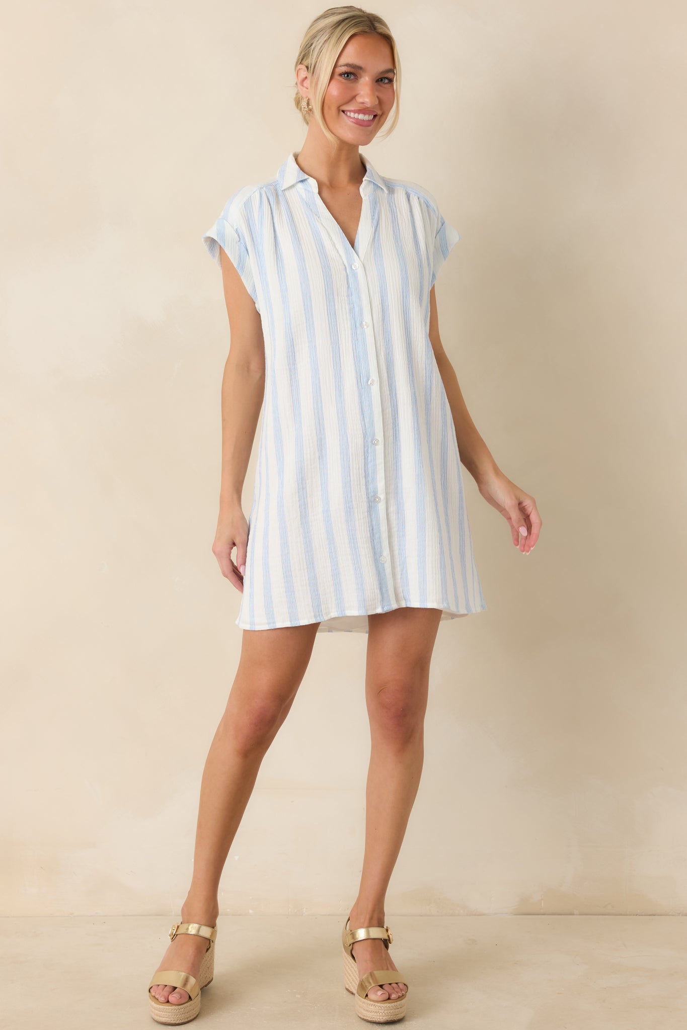 Full-length look showcasing the cap sleeves and softly structured shape designed for warm-weather comfort.