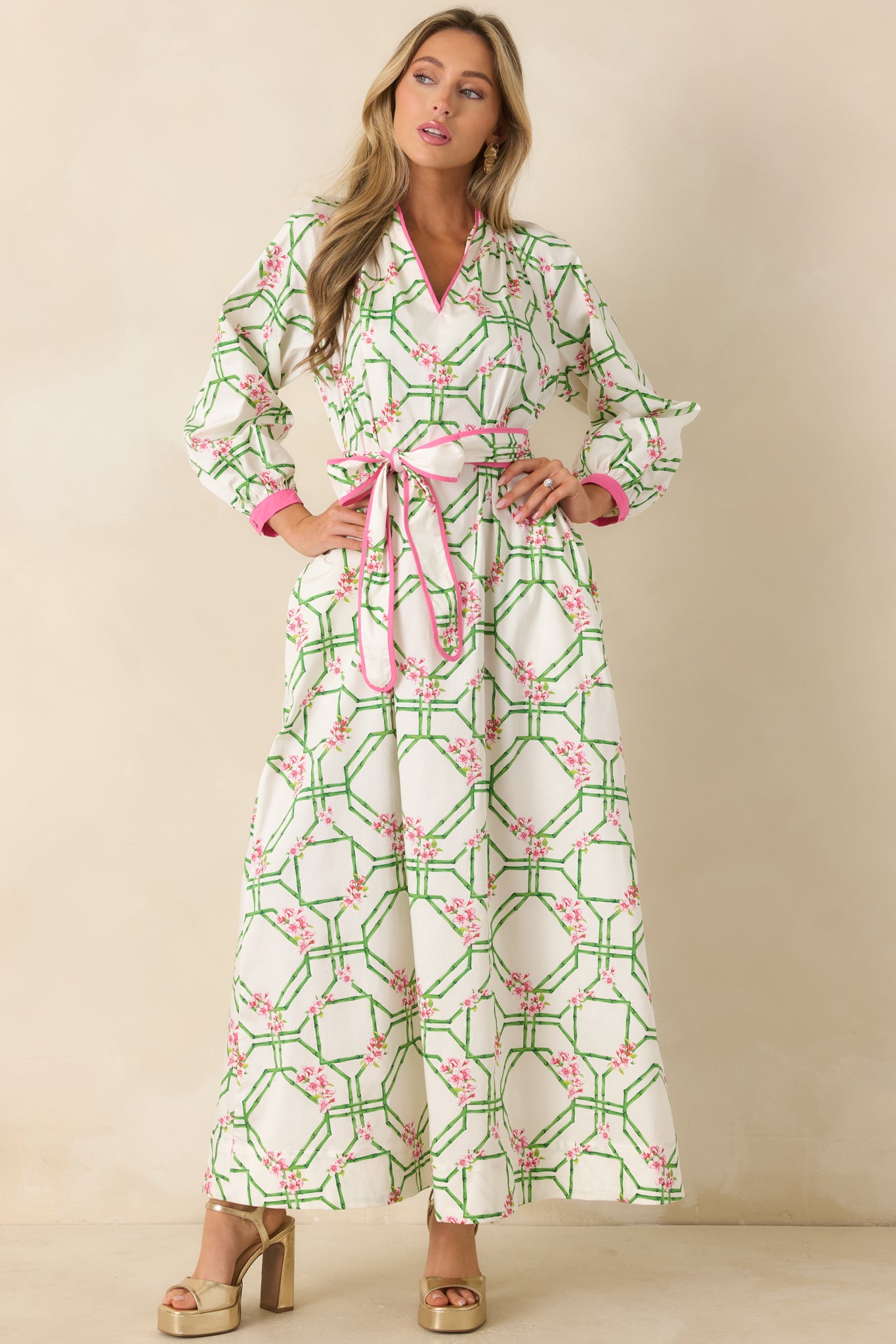 Lightweight maxi dress with long sleeves, pink cuff accents, and a softly draped cotton construction.
