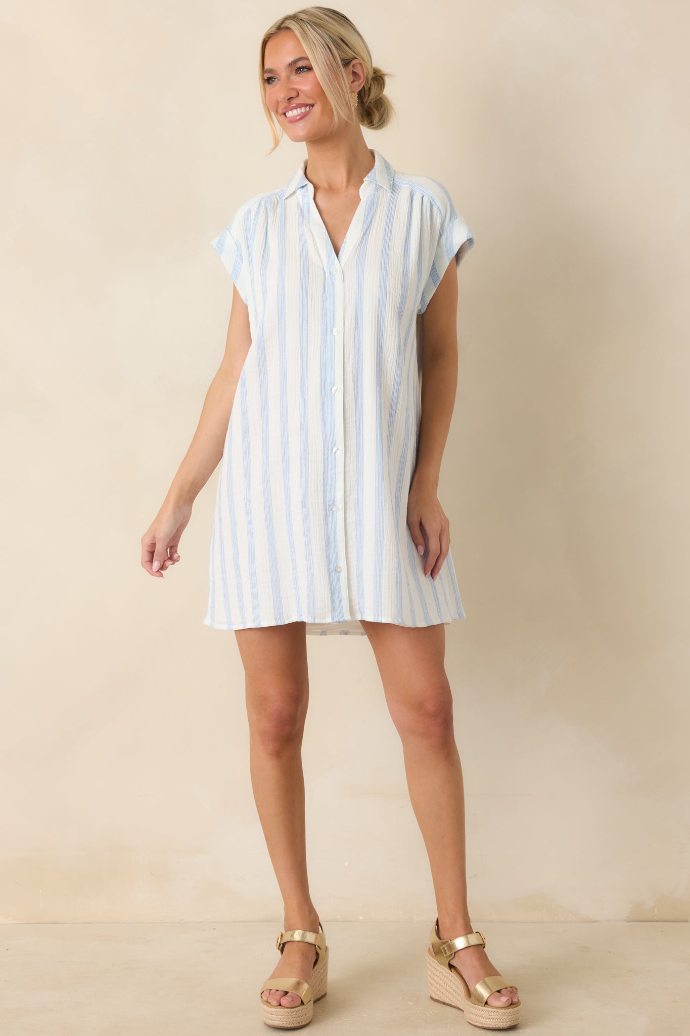 Front-facing view emphasizing the button-down design and effortless, laid-back mini dress fit.
