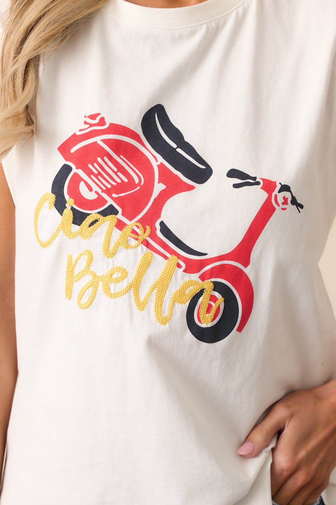 A close-up of the red Vespa-style scooter graphic, with intricate shading and playful vintage charm.