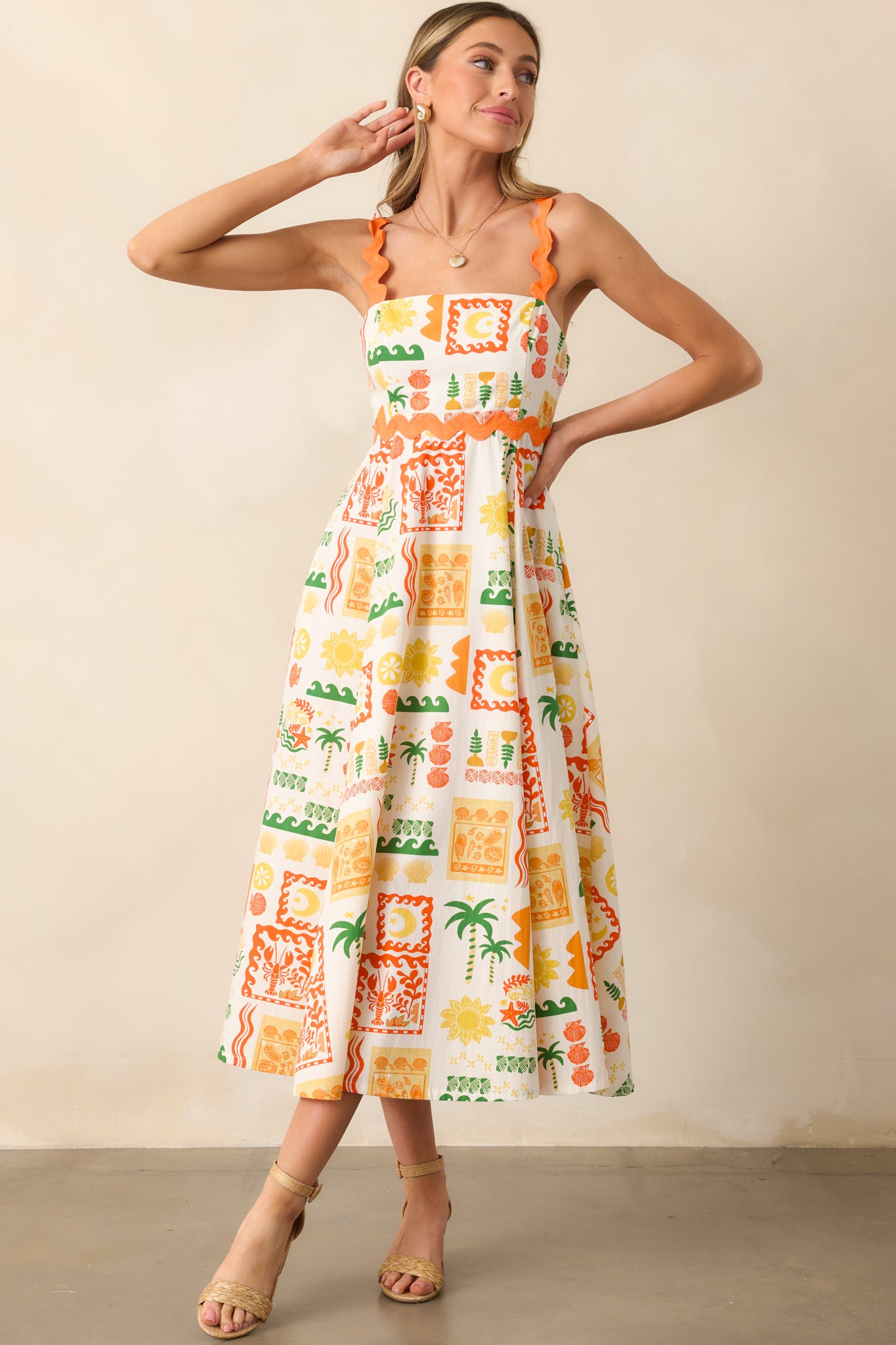 A colorful tropical maxi dress with functional pockets, a hidden zipper, and charming ric rac straps adding a playful touch.