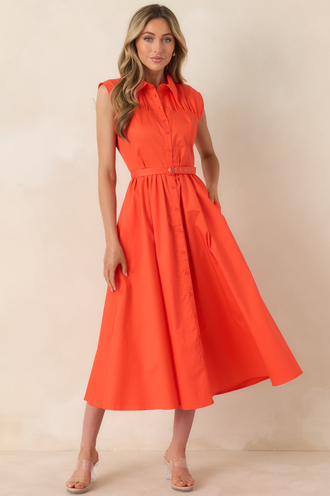 Button-front cotton midi dress with polished collar and full midi skirt with movement.