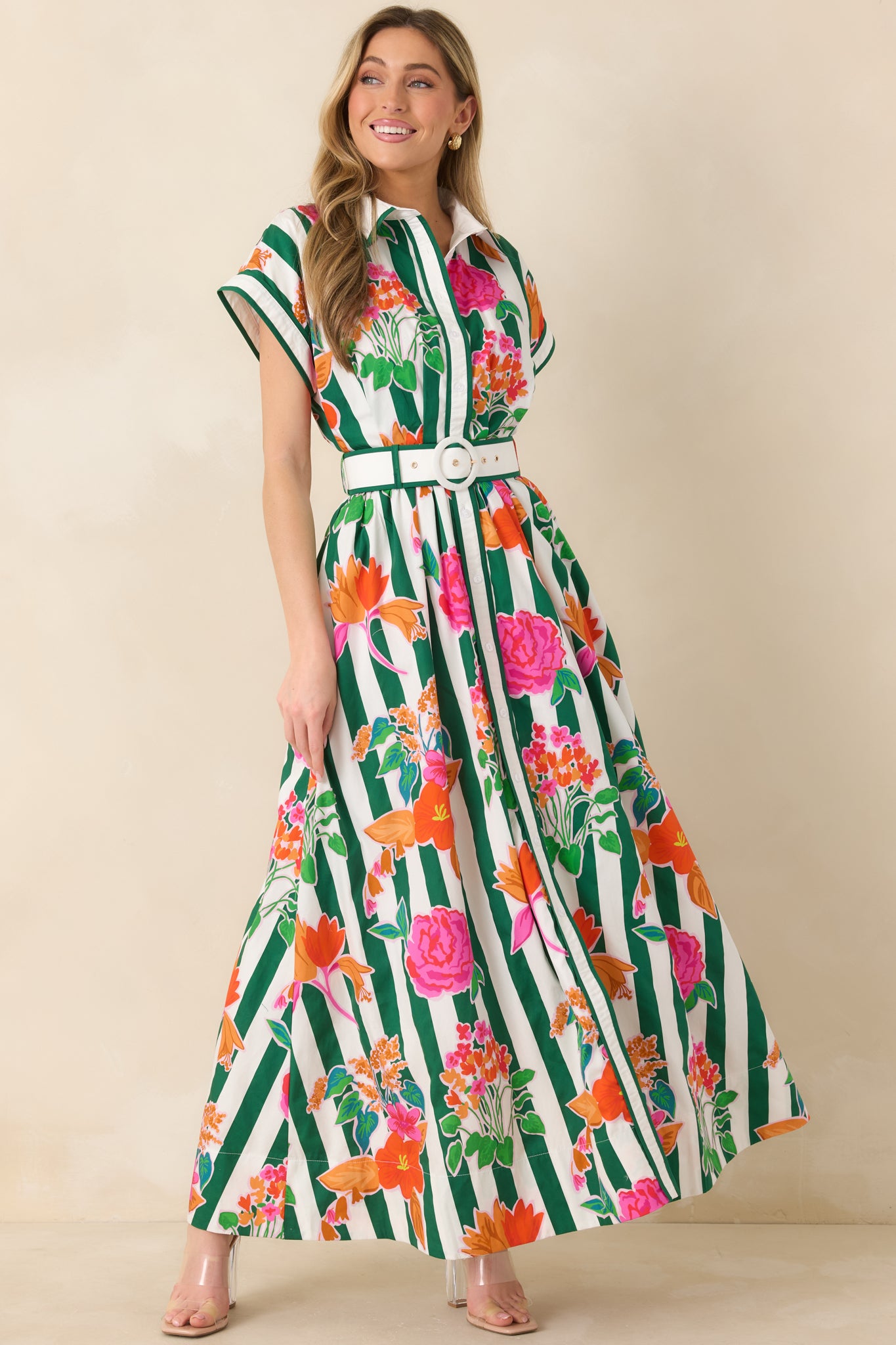 Green multi floral stripe cotton maxi dress with vertical green stripes, vibrant pink and coral blooms, a collared neckline, and button-front bodice.