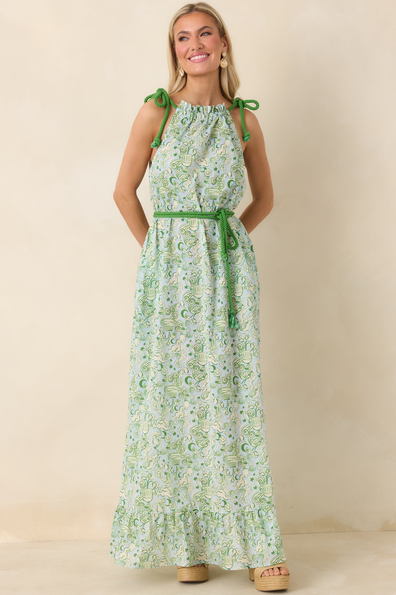 Lightweight woven maxi dress in blue and green with soft neckline gathers and a breezy skirt finished in a subtle ruffle.