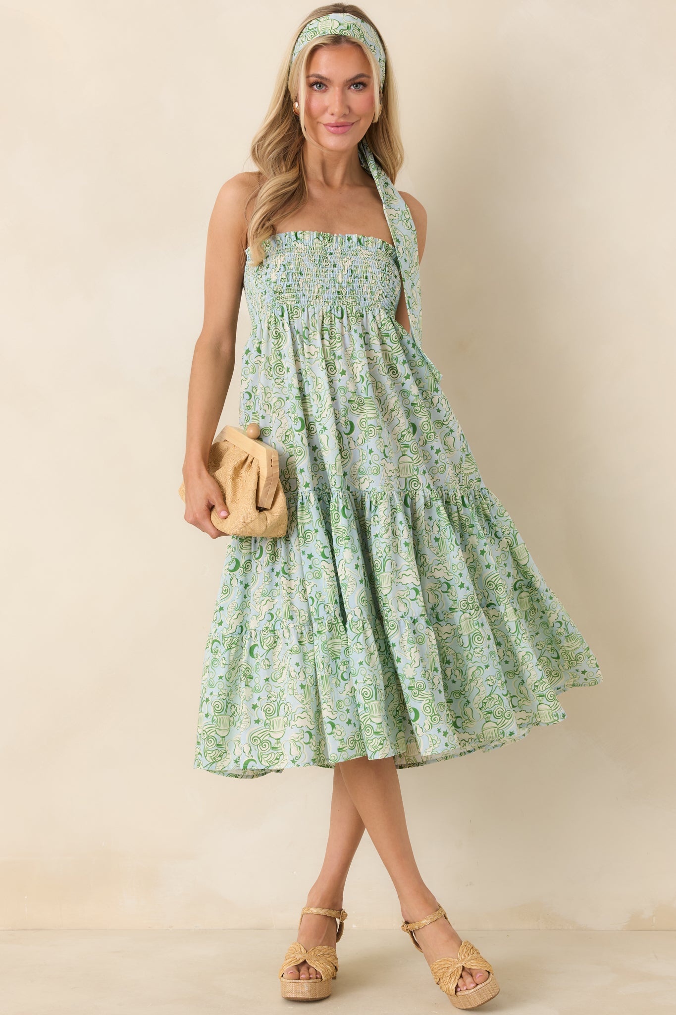 Blue and green strapless midi dress with elastic smocked bodice, relaxed skirt, and airy knee-to-calf length silhouette.