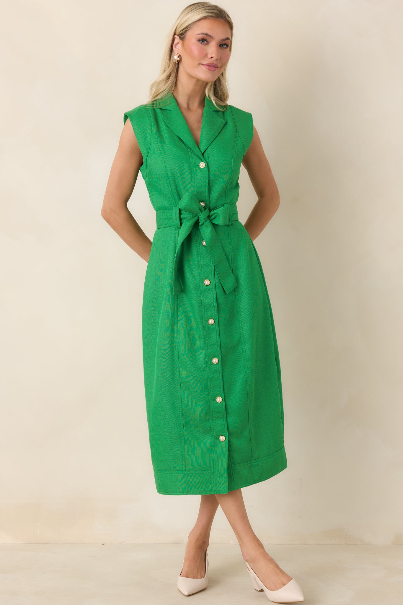 Front angle emphasizing functional buttons, lapel collar, and lightweight woven material.