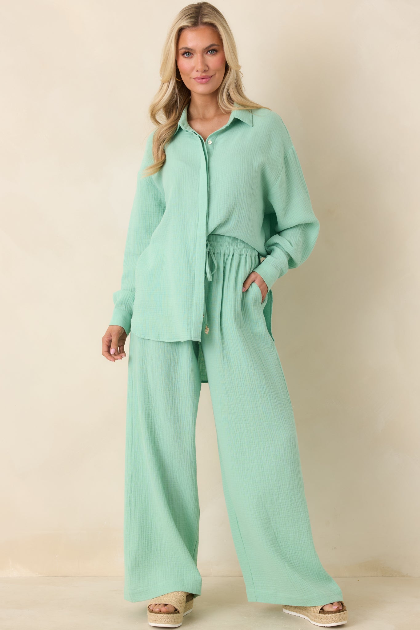 Light green gauze button-up top with classic collar, full front button closure, and relaxed oversized silhouette.
