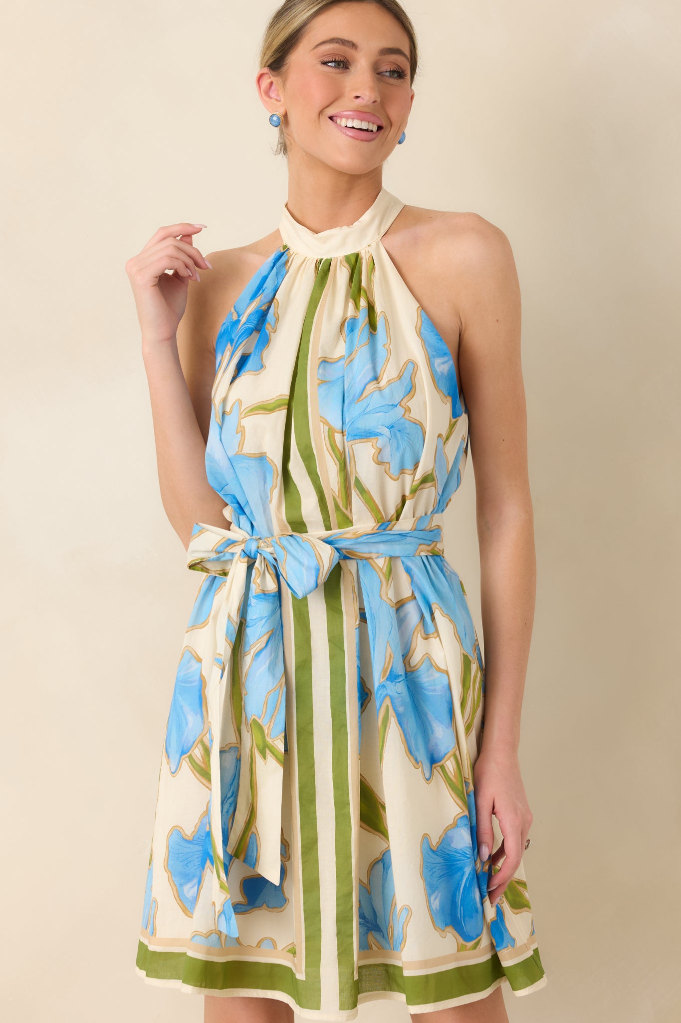 Mini dress front highlighting lightweight fabric and vibrant floral design.