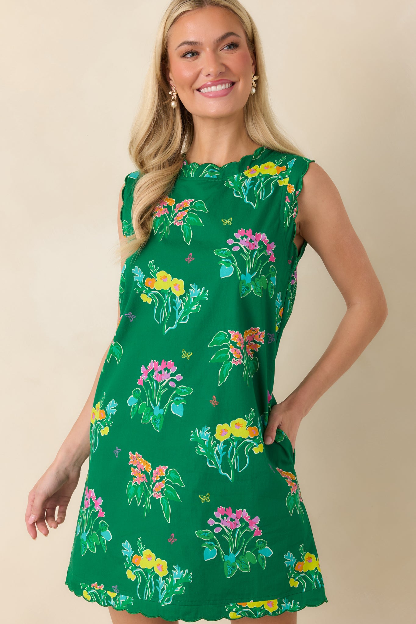 Highlight of lightweight fabric, vibrant floral print, and gentle scalloped edges.