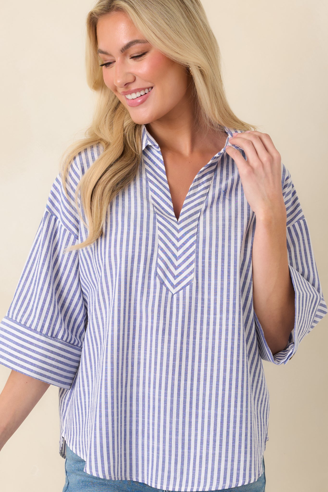 Cropped front view highlighting the blue and white vertical stripe pattern and smooth fabric drape.