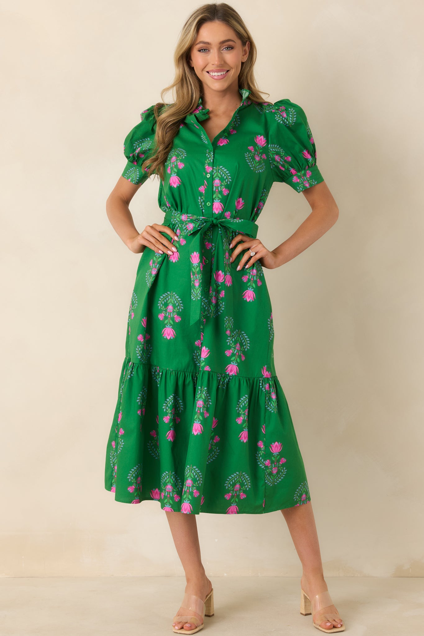 Button-front midi dress featuring a removable self-tie belt, floral pattern, and structured puff sleeves.
