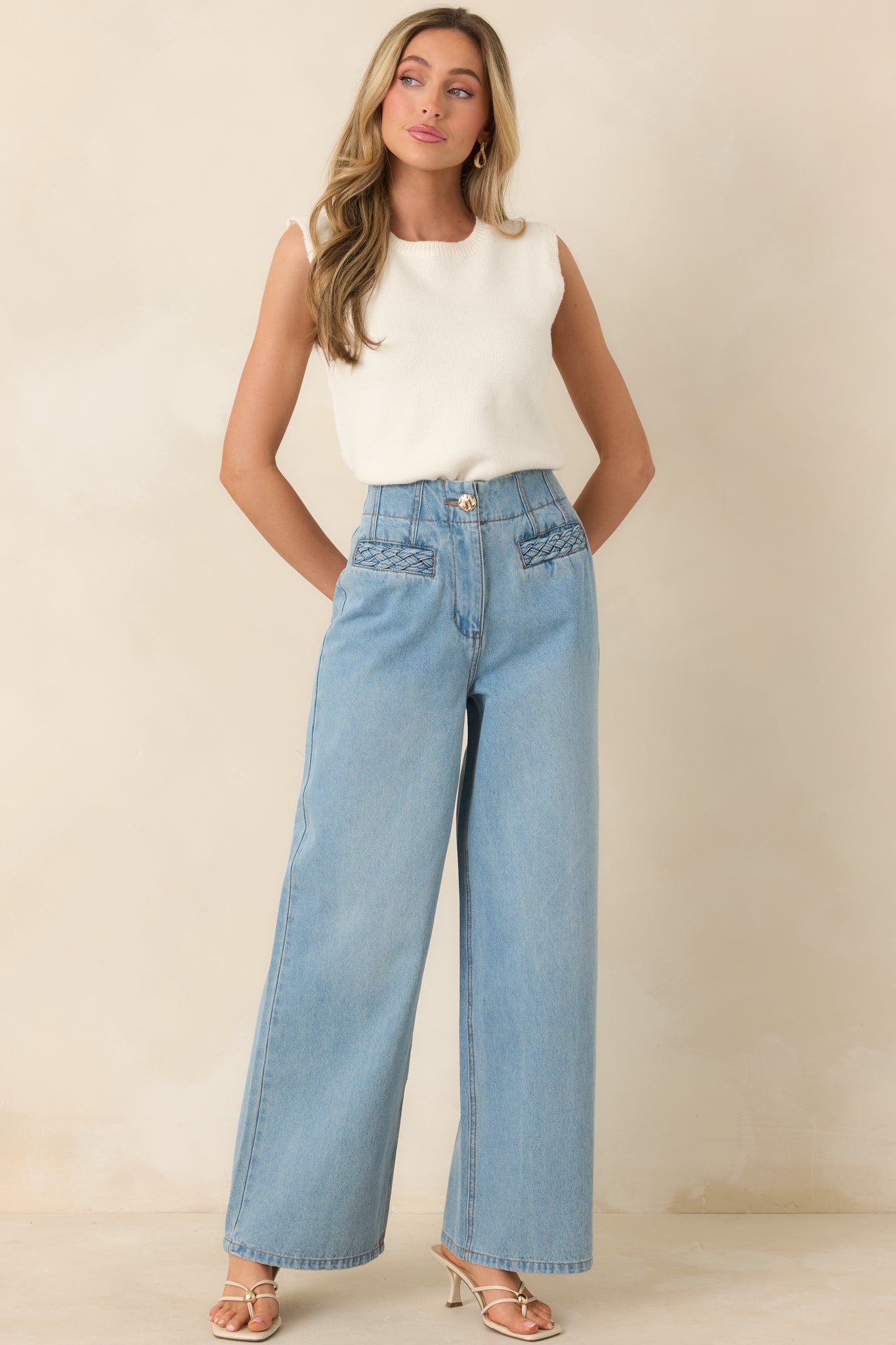 Relaxed-fit high-rise jeans in light wash denim with timeless five-pocket design and clean, effortless lines.