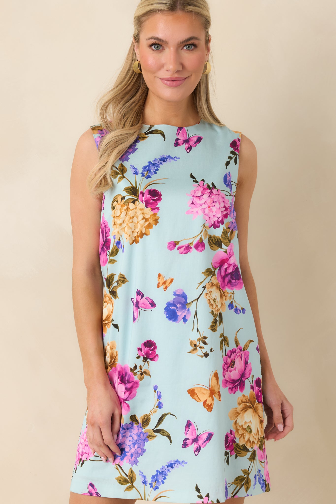 Cropped front view focusing on the round neckline and sleeveless armholes.