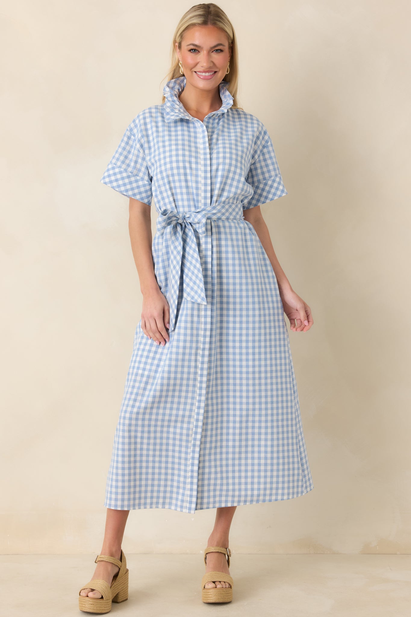 Full-body view of the blue and white maxi dress highlighting its relaxed fit and softly tailored silhouette.