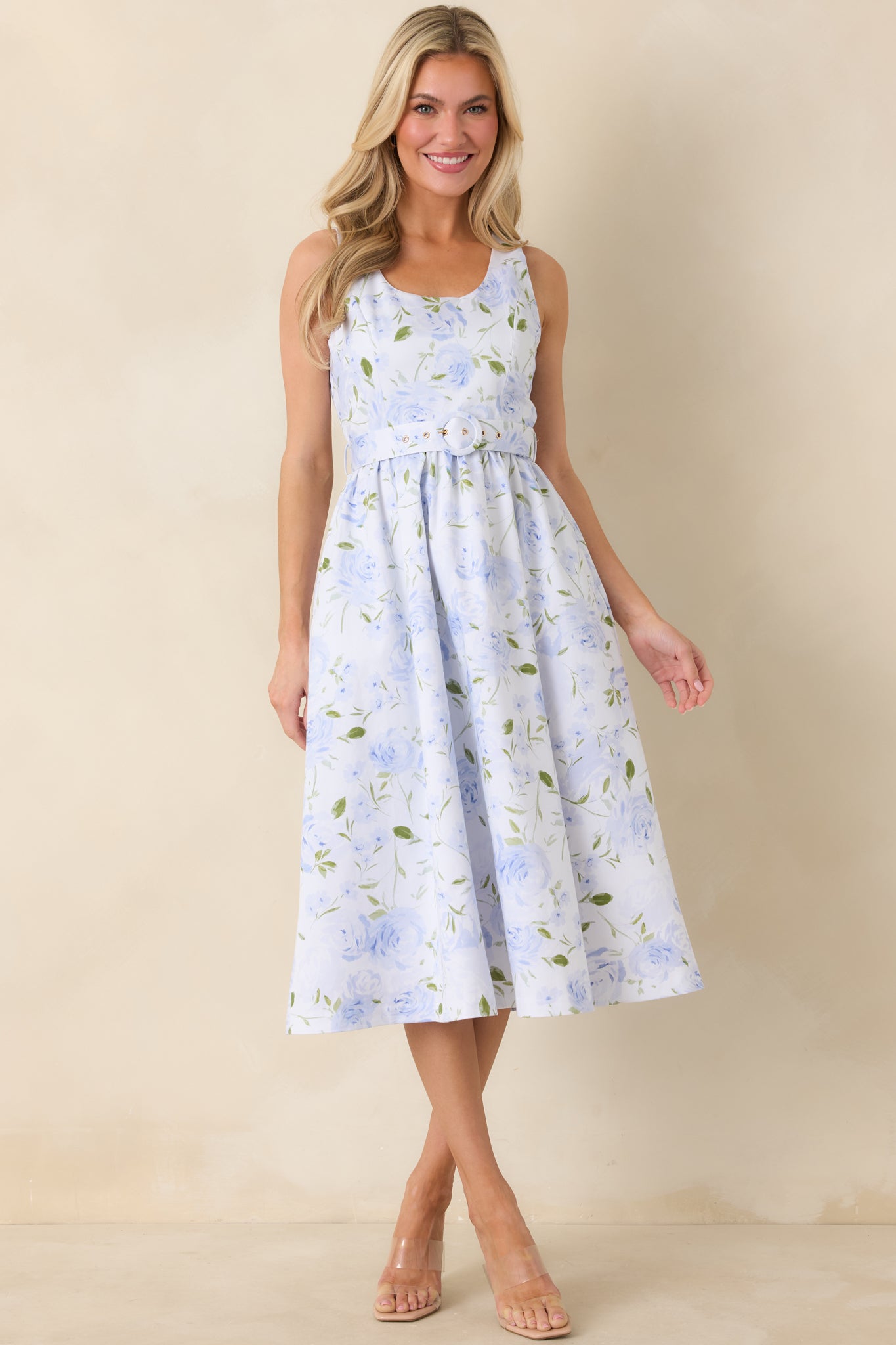 Full-length front image showcasing the gently flared skirt and clean midi-length hem.