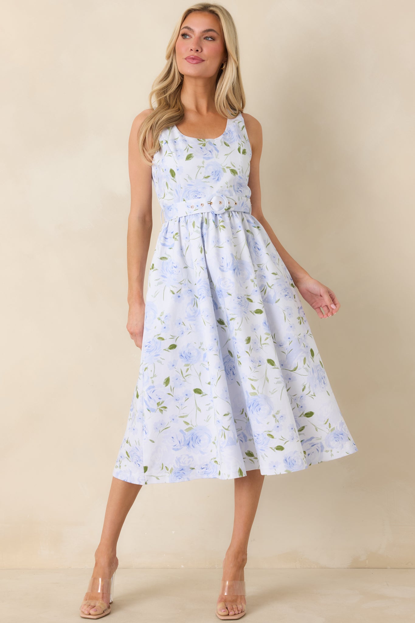 Front-facing full-length view of the light blue midi dress showing the scoop neckline and sleeveless design.