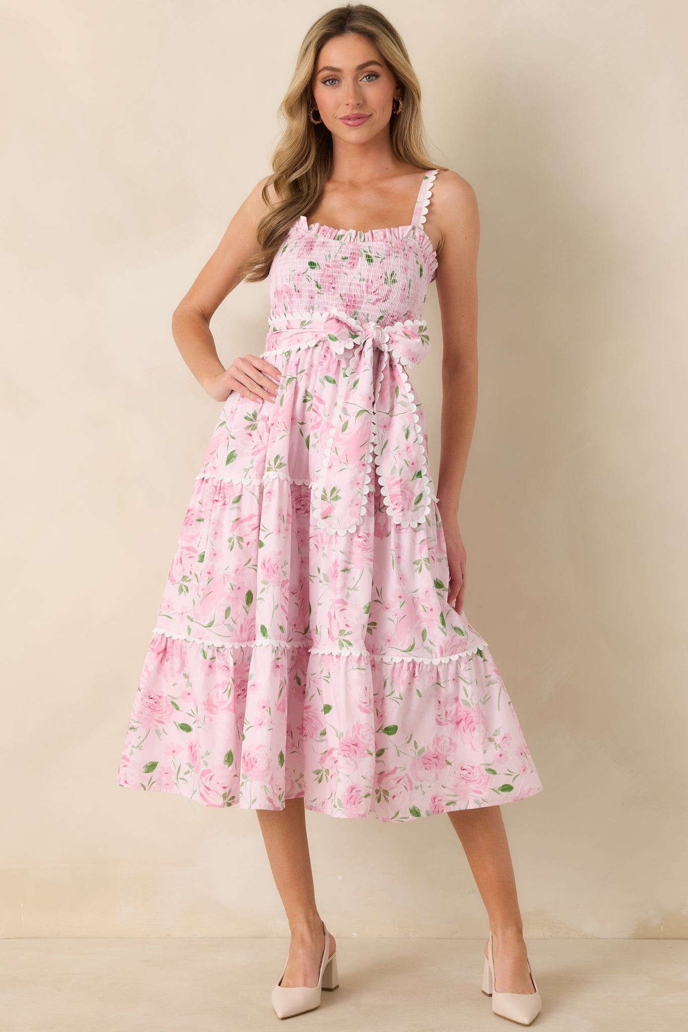 Front-facing angle highlighting the adjustable shoulder straps with scalloped trim and self-tie waist belt.