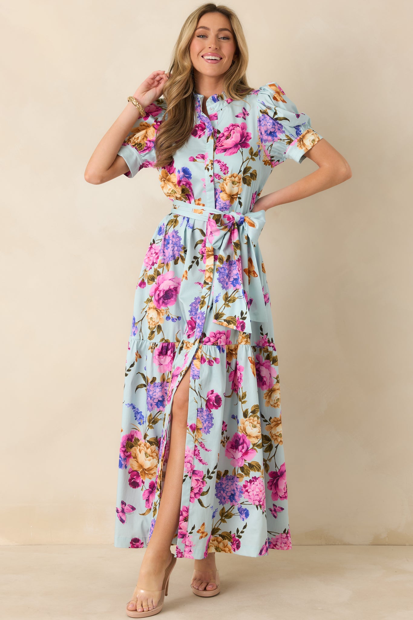 Straight-on front view emphasizing the tiered maxi skirt and vibrant multicolor pattern.