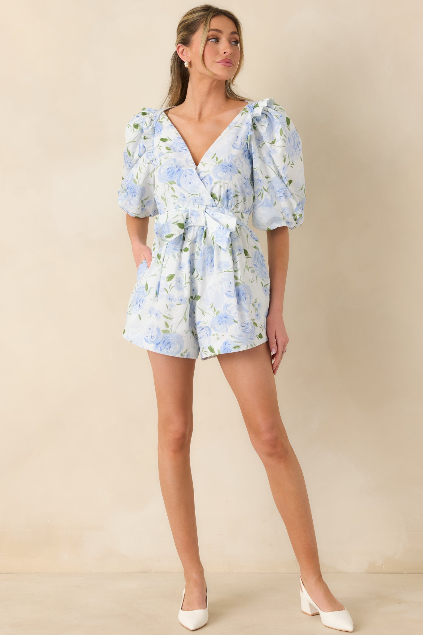 Front-facing full body image showcasing the fitted waistband, adjustable self-tie belt, and relaxed short silhouette.