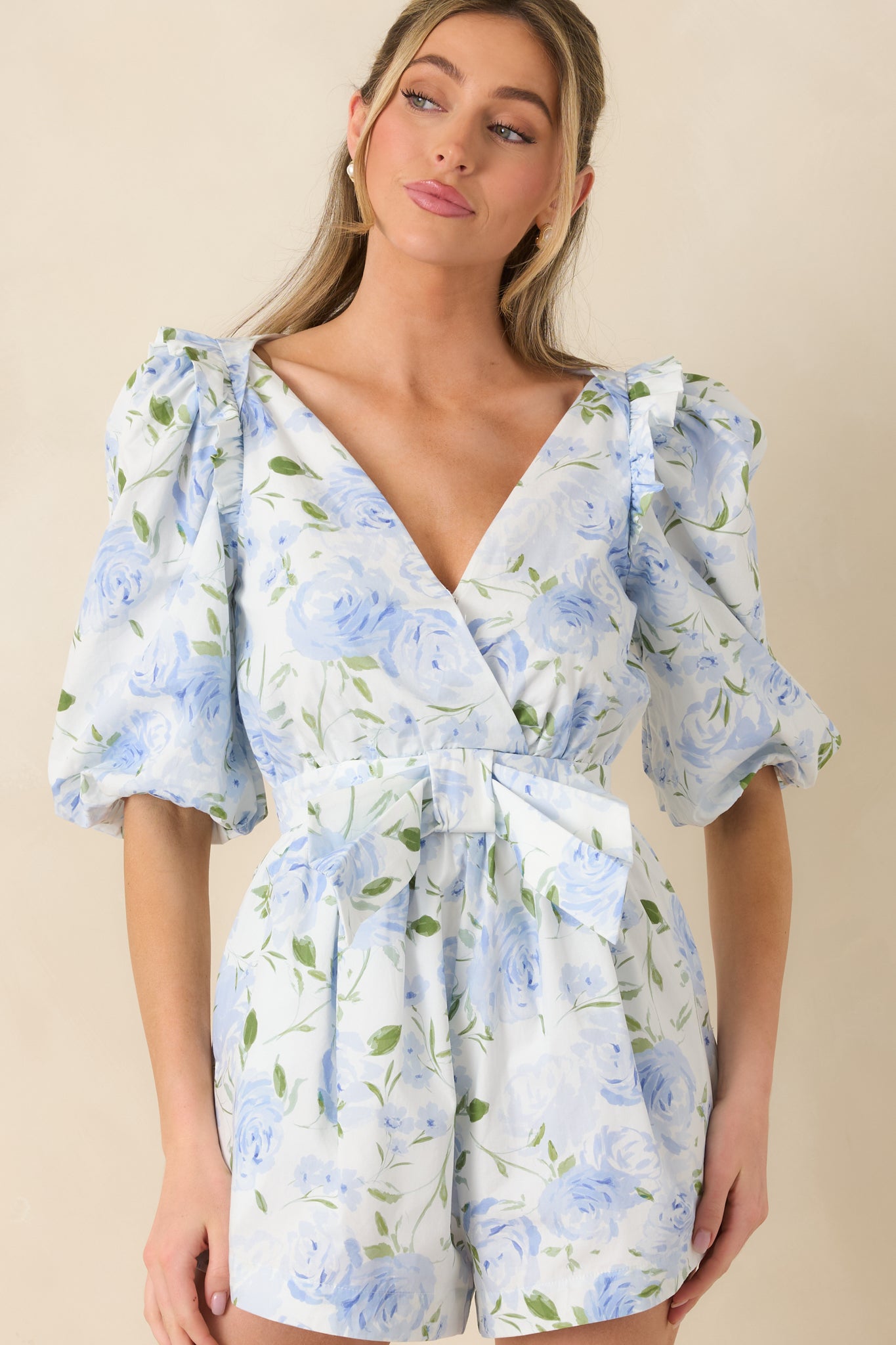 Midsection crop highlighting the fitted waistband and adjustable self-tie belt detail.