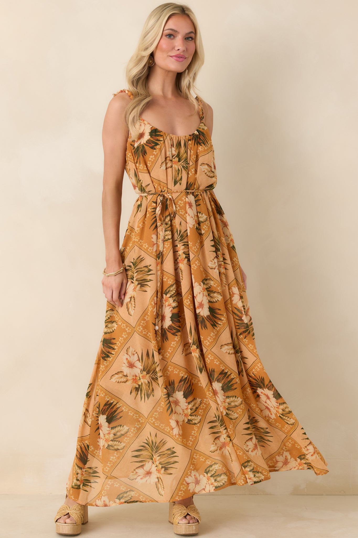 Front-facing view highlighting flowing silhouette, adjustable self-tie waist, and vibrant tropical pattern.