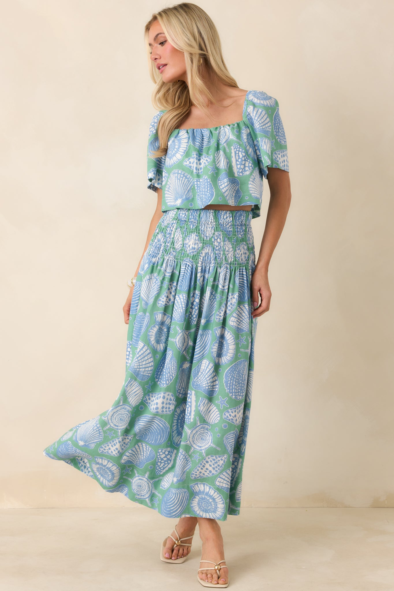 Complete shot of the maxi skirt showcasing its high-waist design and lightweight cotton fabric.