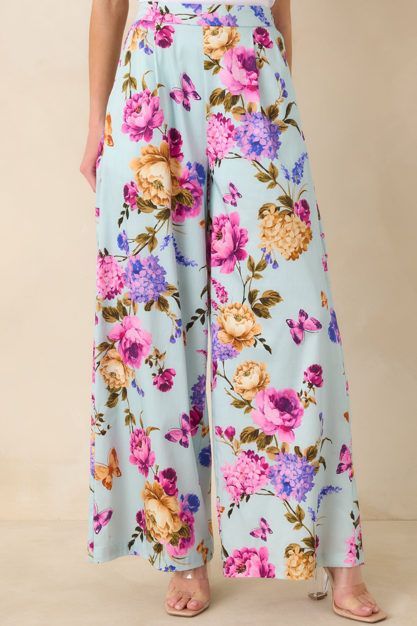Cropped front view showcasing the side pockets and flowing wide-leg design.