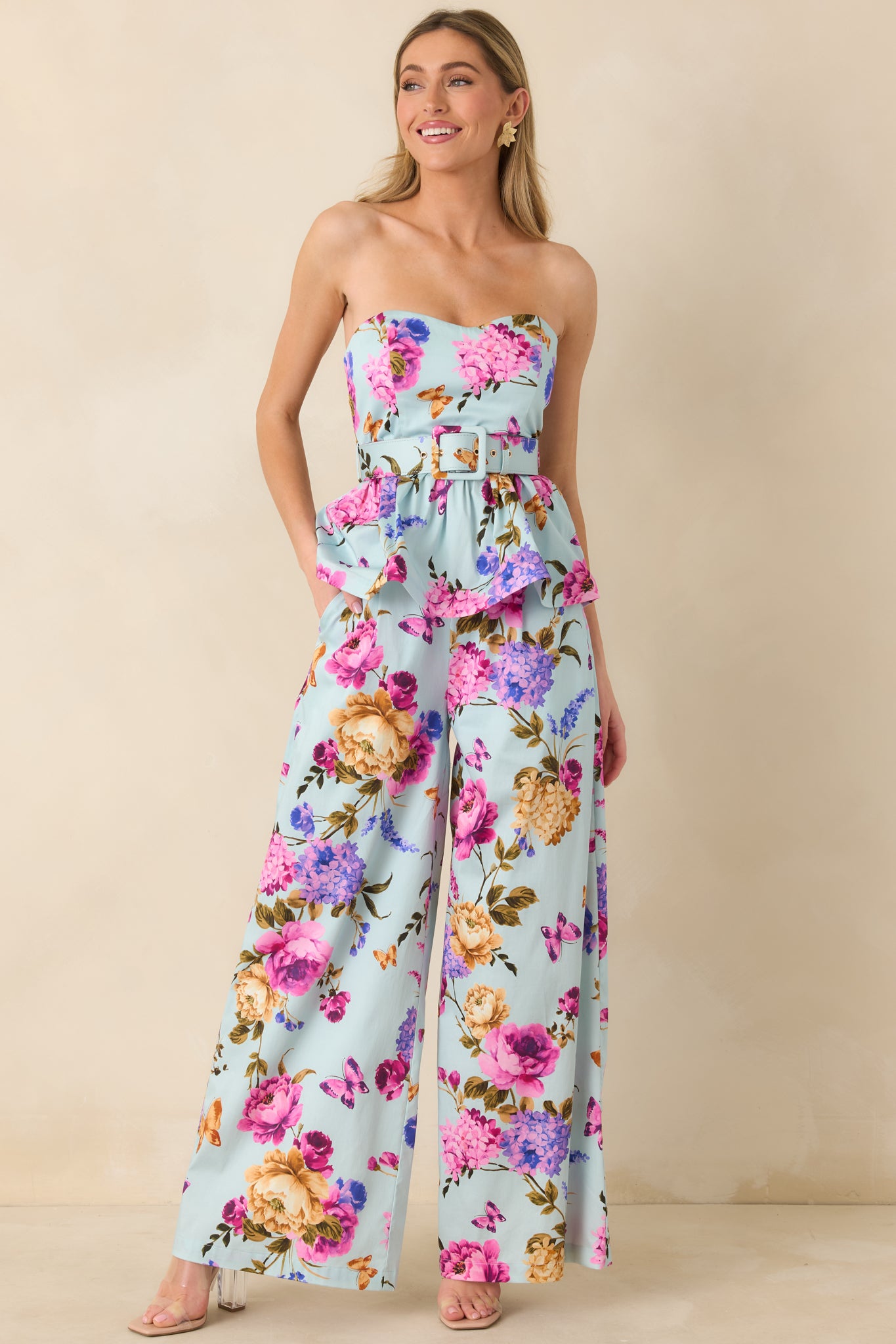 Straight-on front view highlighting the relaxed wide-leg silhouette and functional side pockets.