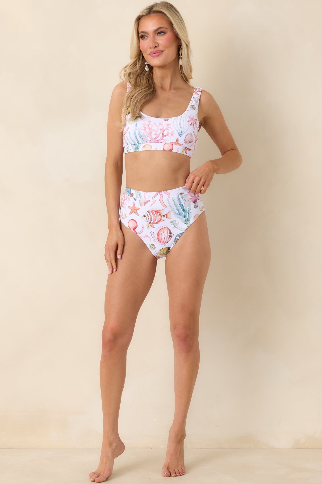 Multicolored bikini bottoms with moderate coverage and smoothing high-rise waistband.