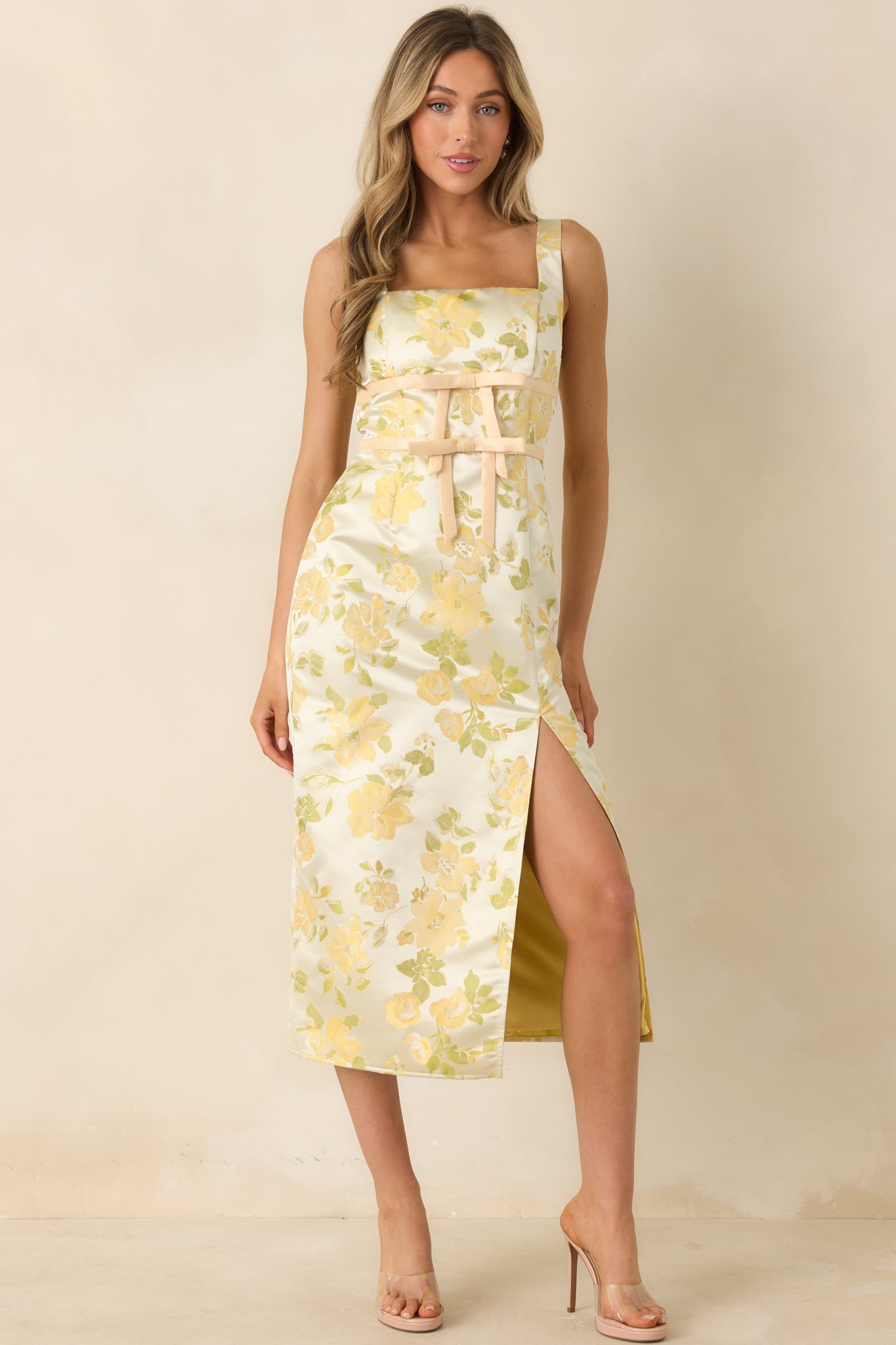 Satin finish floral dress with square neck, wide straps, and softly fitted shape.