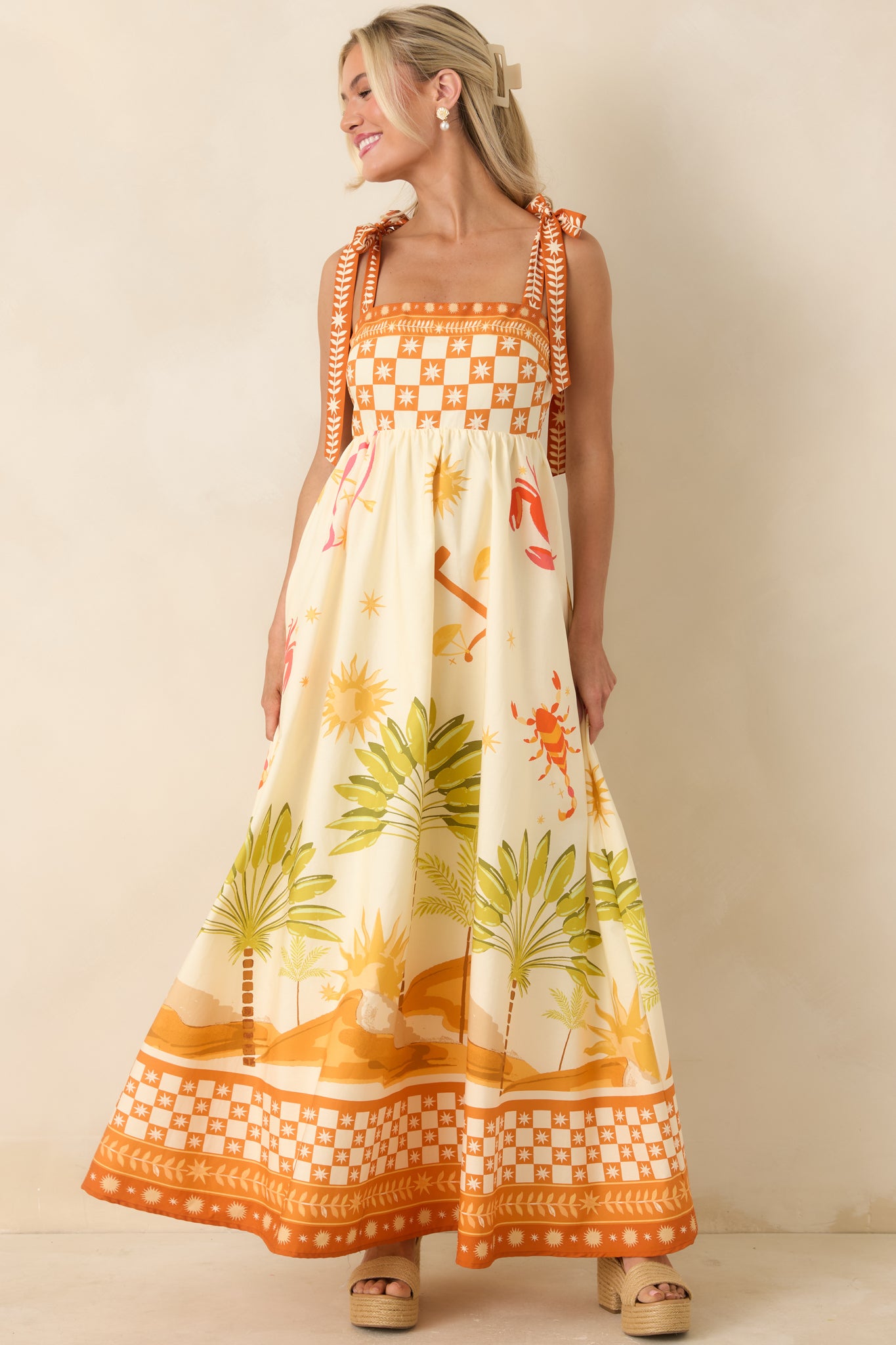 Flowy ivory dress with adjustable straps and seamless concealed back zipper.