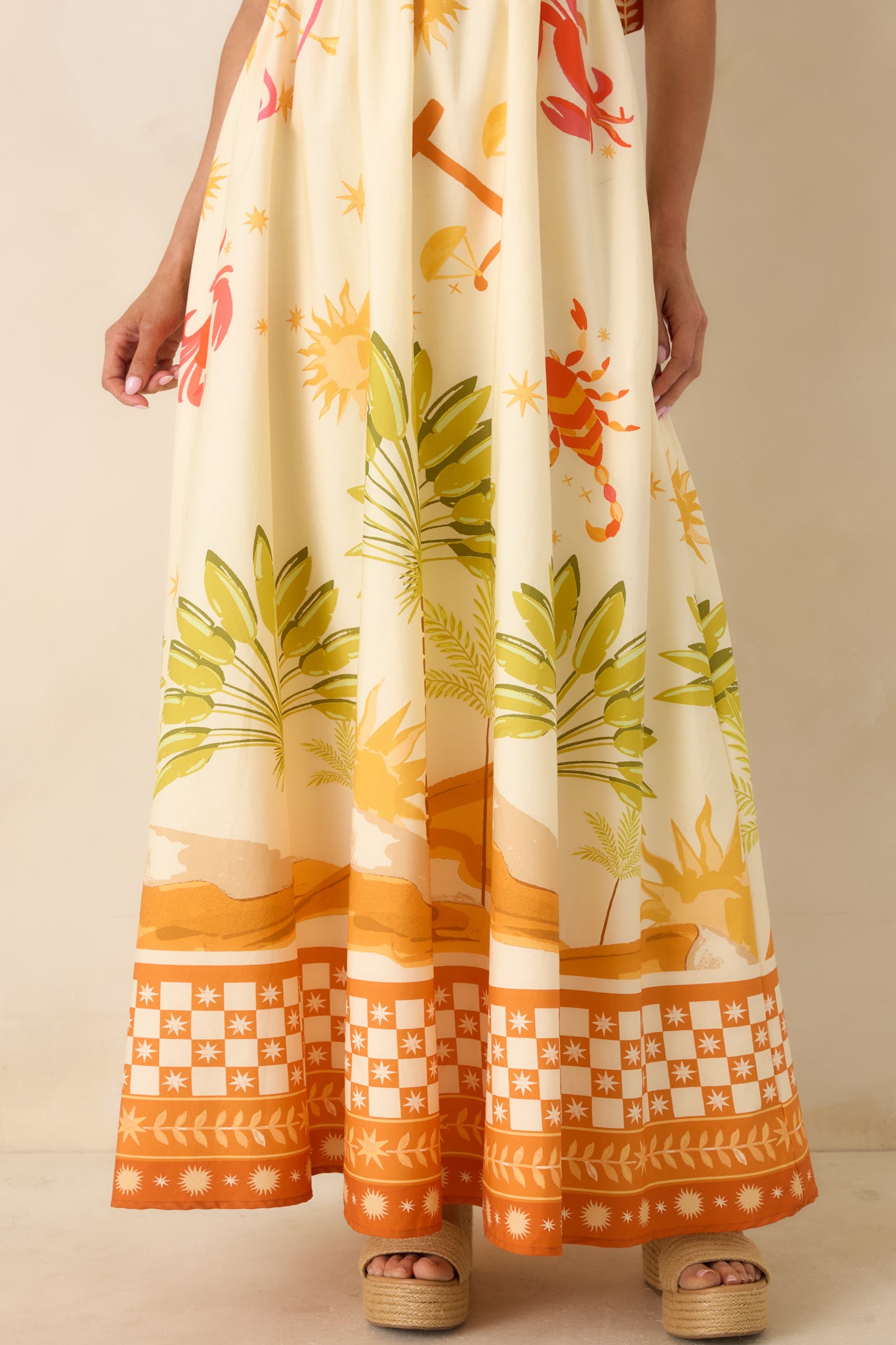 Close-up of mixed pattern and statement border print on lightweight cotton fabric.