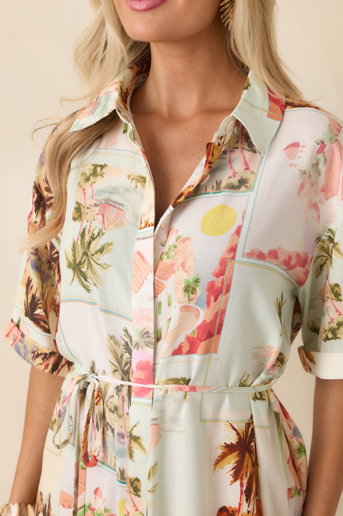 Close-up of vintage postcard print mini shirtdress highlighting the intricate pattern, buttons, and lightweight fabric texture
