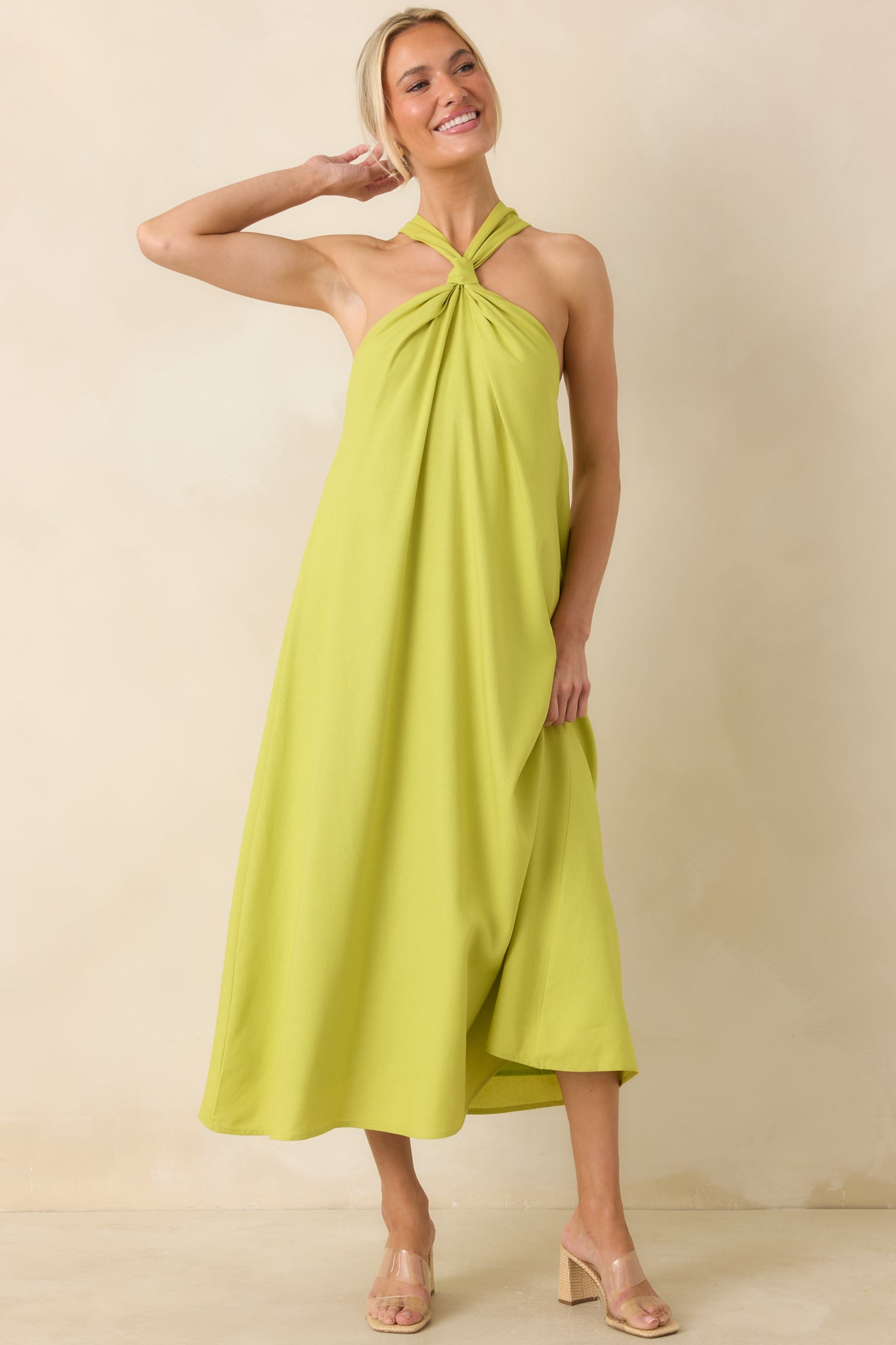 Flowy chartreuse dress featuring a draped neckline, lightweight construction, and effortless relaxed silhouette.