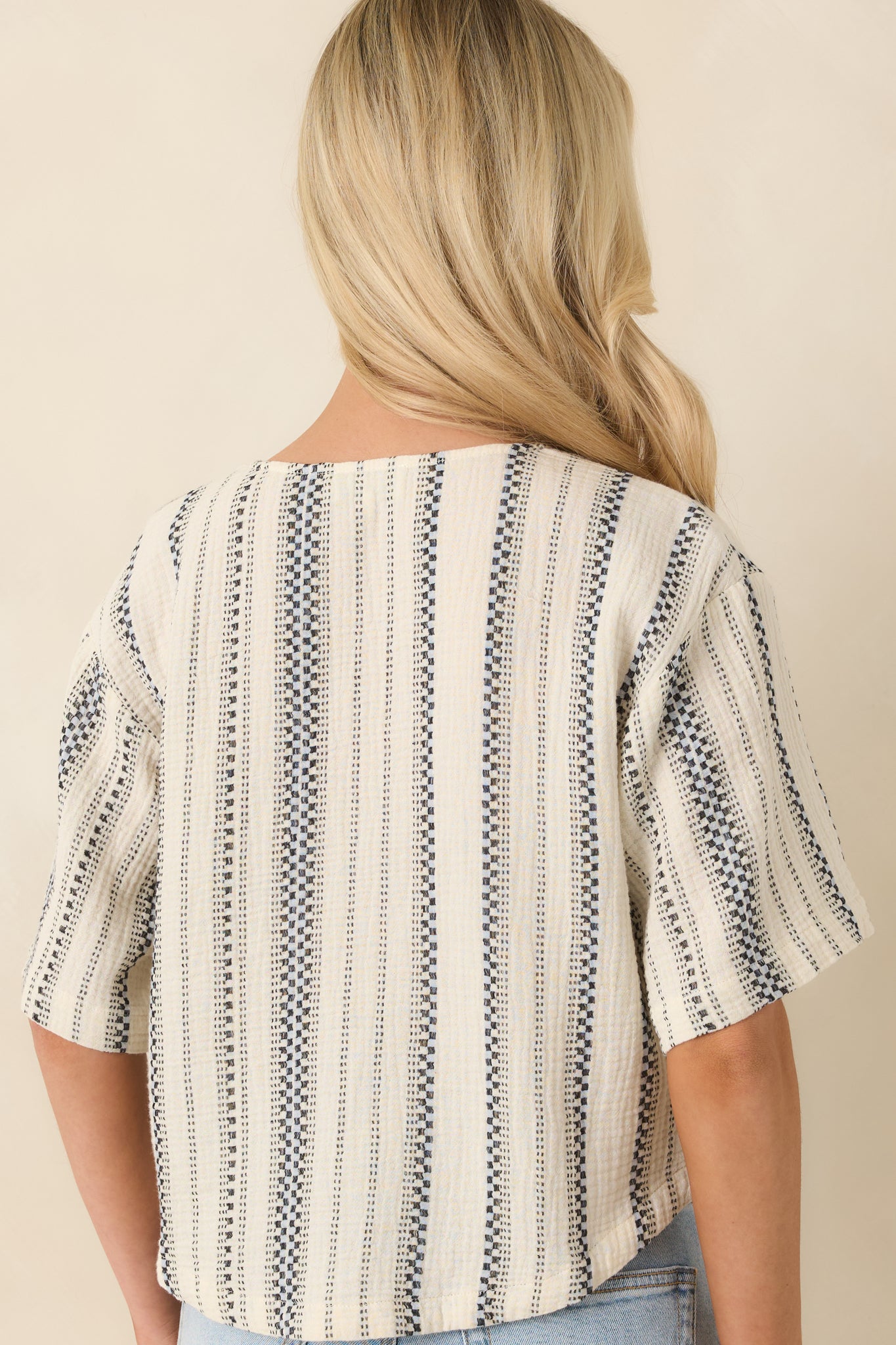 Striped cotton top with clean rear silhouette and slightly cropped modern shape.