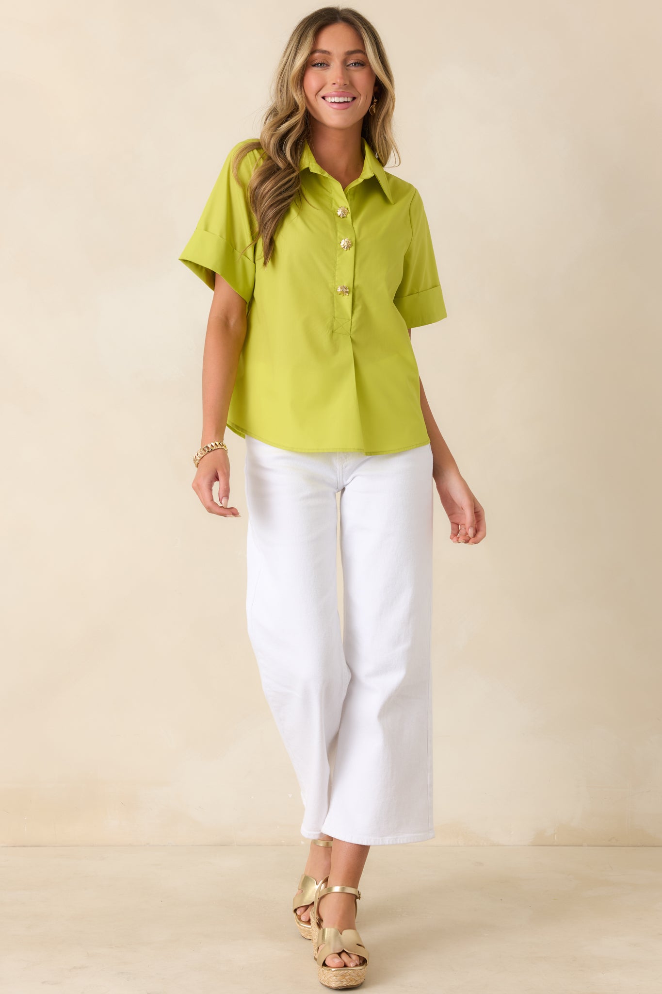 Relaxed short sleeve blouse with structured collar and smooth drape offering a refined yet effortless silhouette.