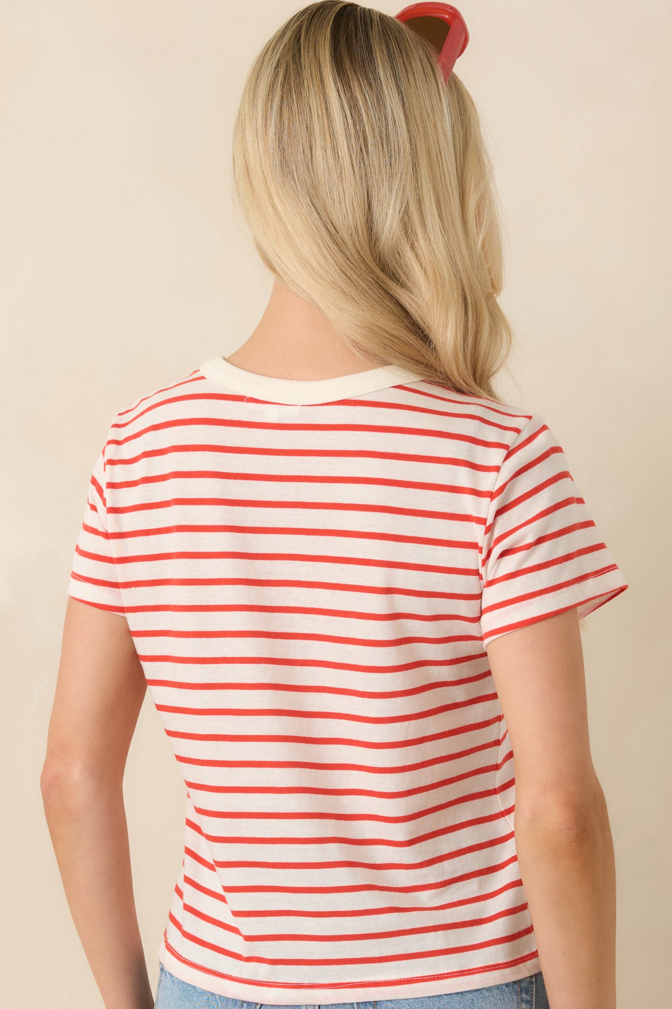Rear view of the striped tee featuring a clean crew neckline finish and relaxed silhouette with continuous stripe patterning.