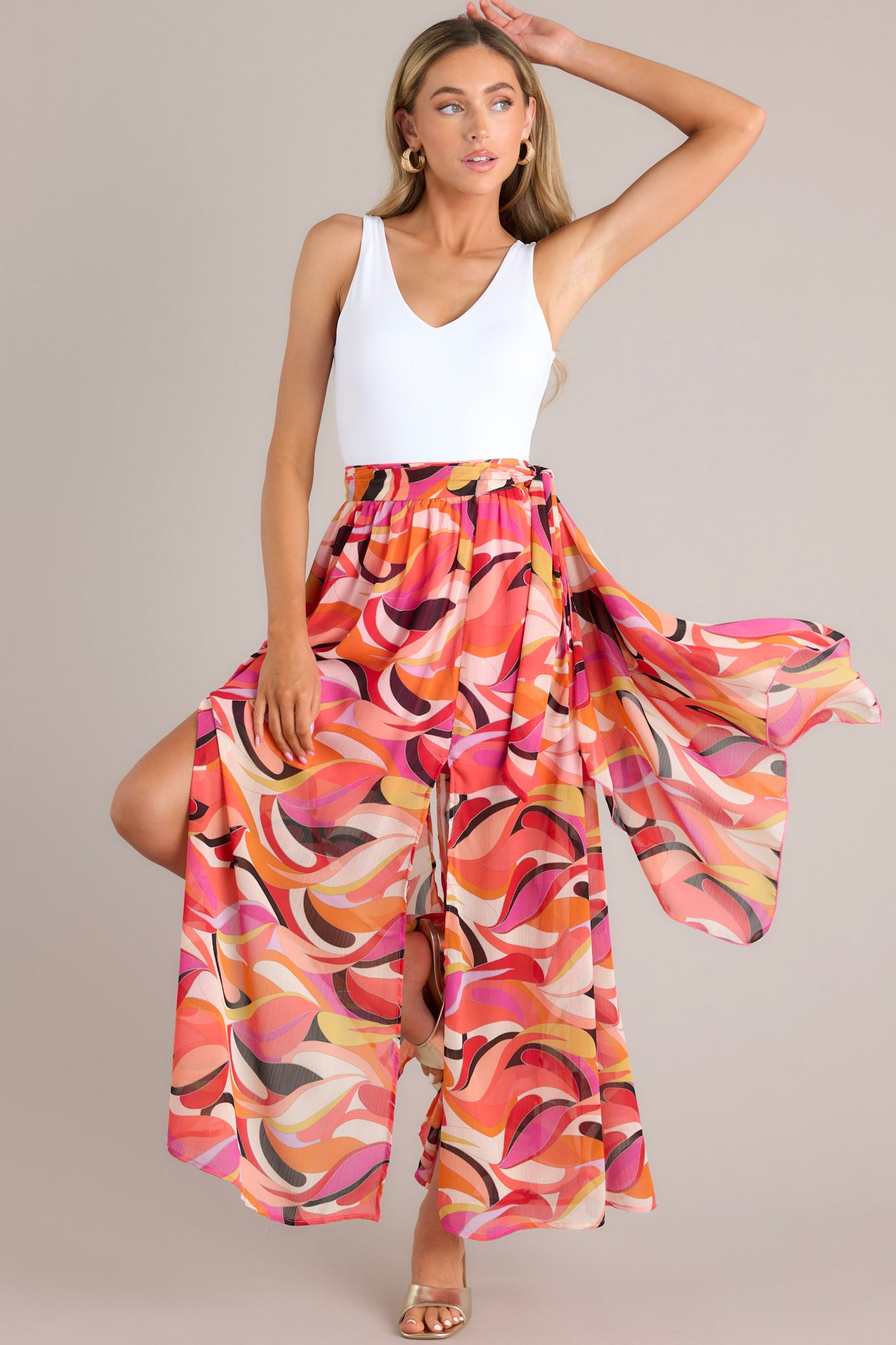 Front view of this skirt that showcases the movement of the fabric in a walking motion.