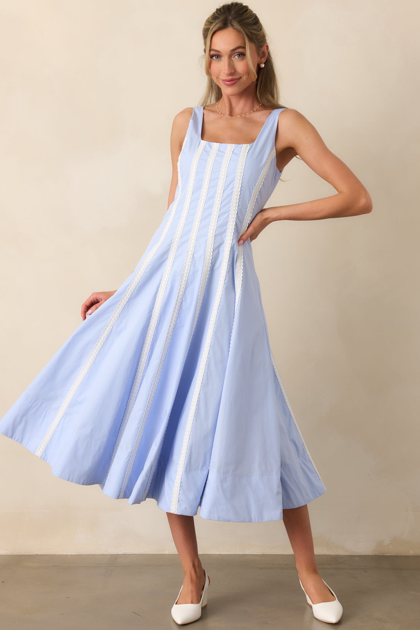 Baby blue midi dress featuring a square neckline, fitted bodice, and delicate white lace trim stripes throughout.
