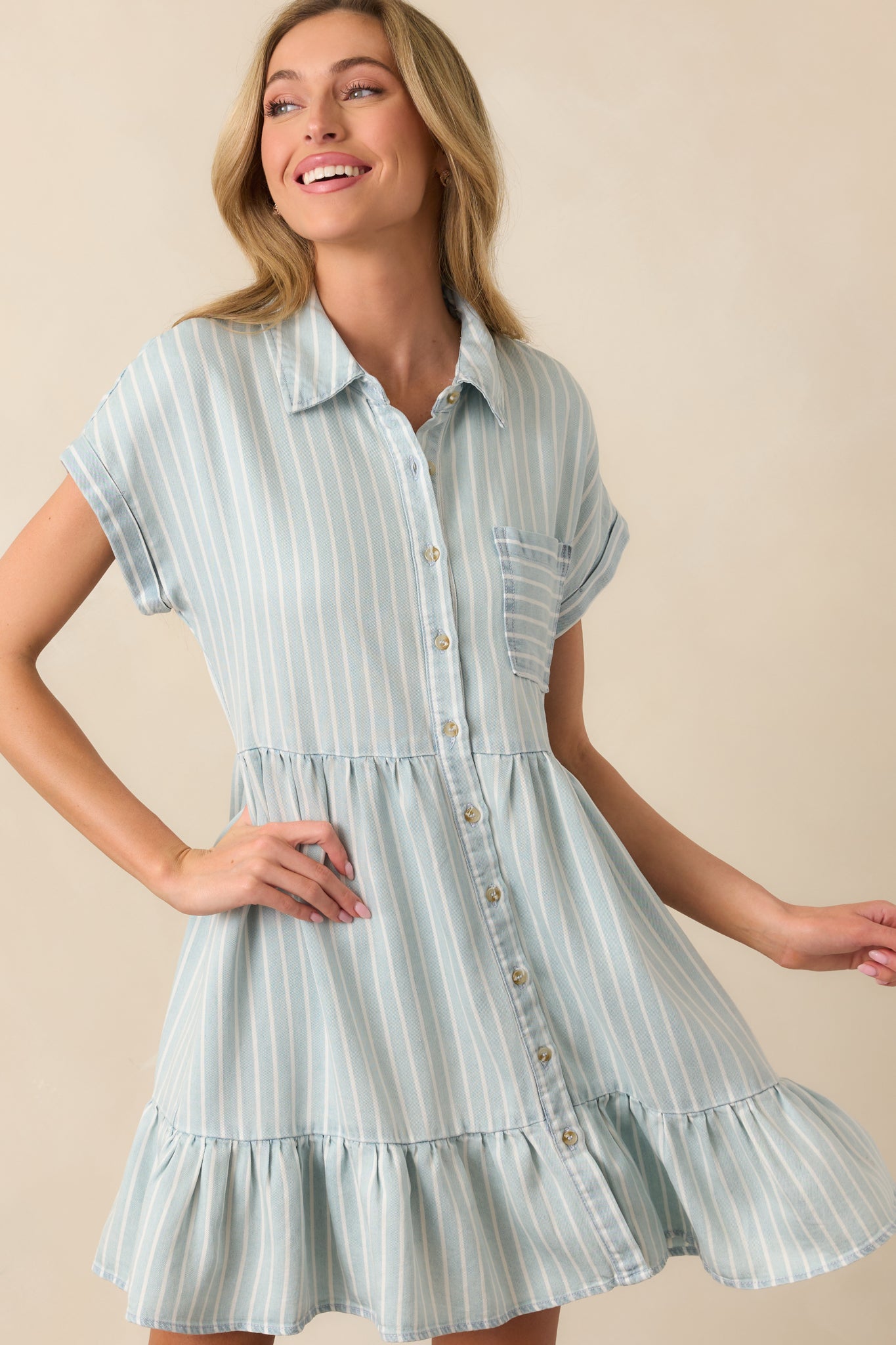 A partial view of the tiered design, emphasizing the soft drape and movement of the fabric.