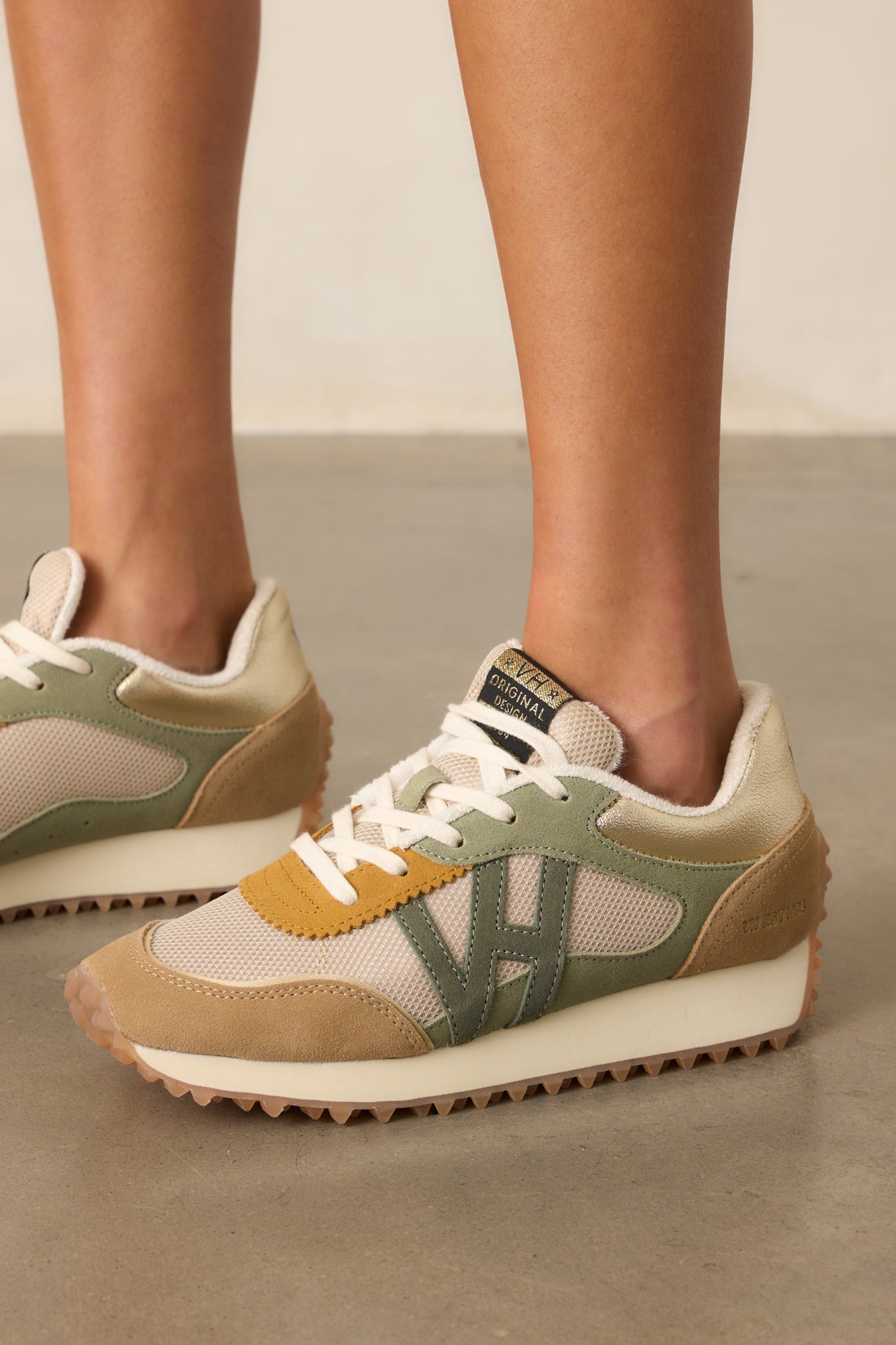 Zoomed-in shot of the sole edge revealing the pronounced spikey texture in sharp detail.