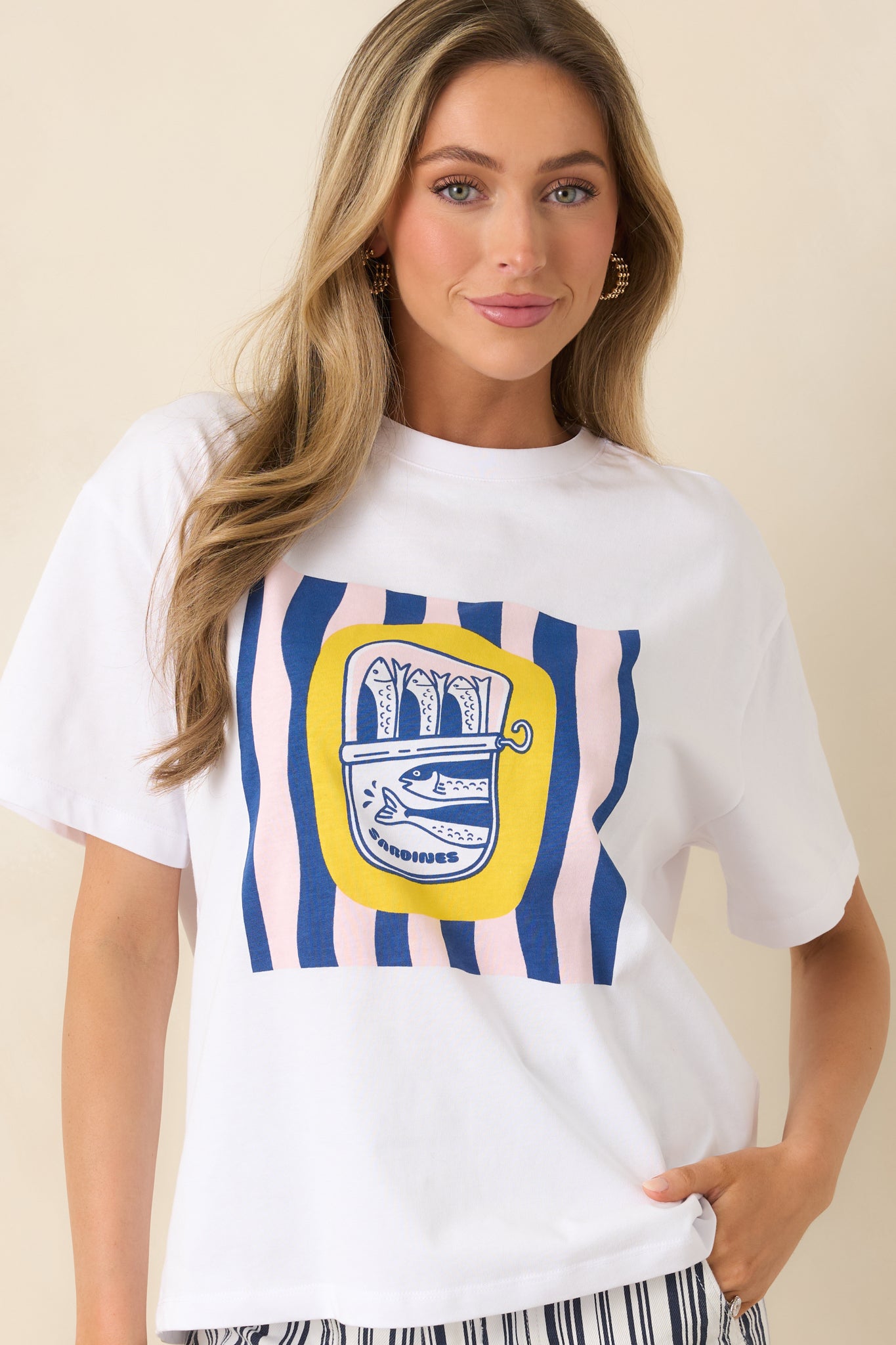 Cropped view showing relaxed silhouette and lightweight cotton texture.