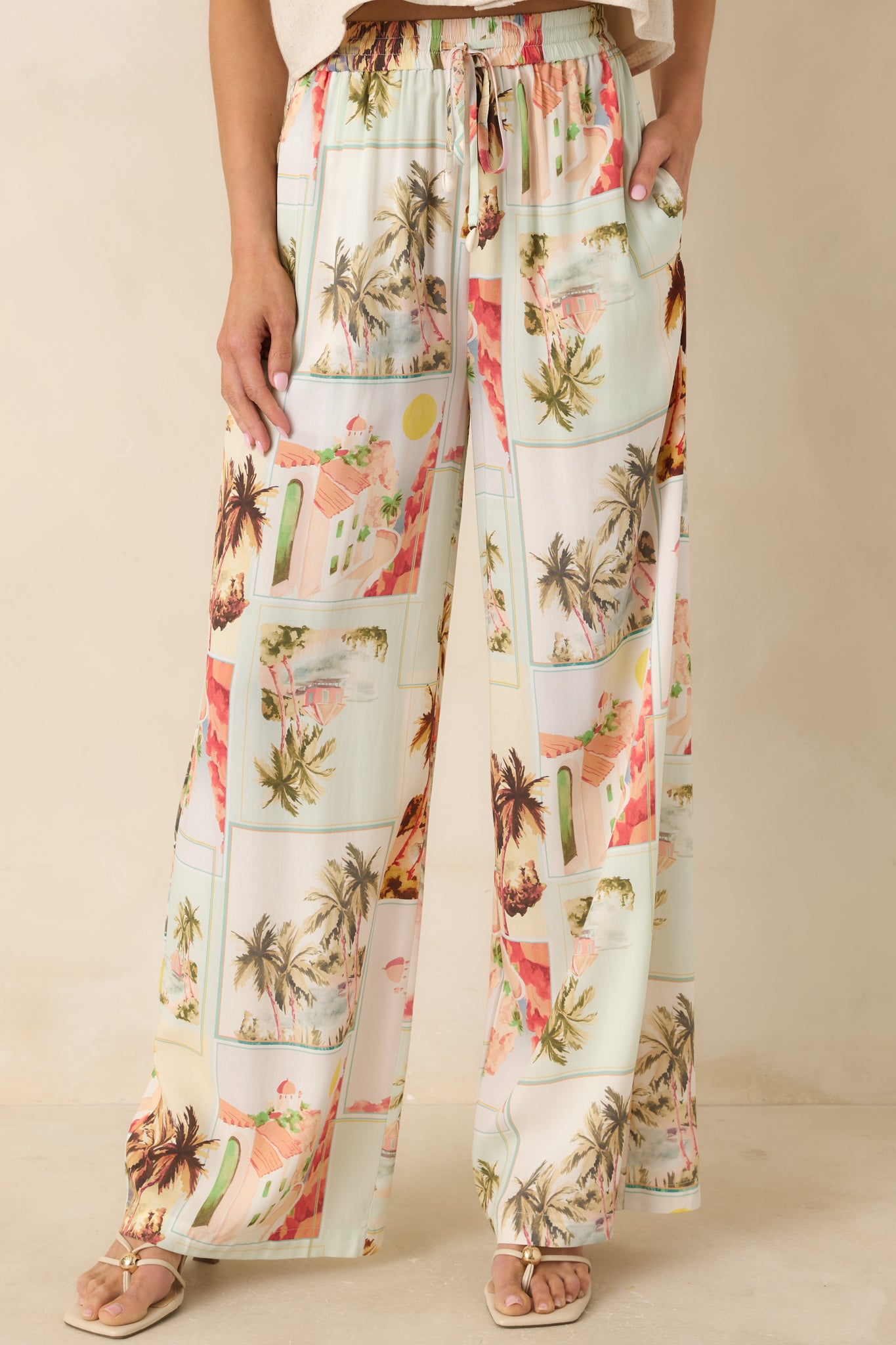 Close cropped detail of the drawstring waistband on wide-leg pants, showing the adjustable fit and soft fabric