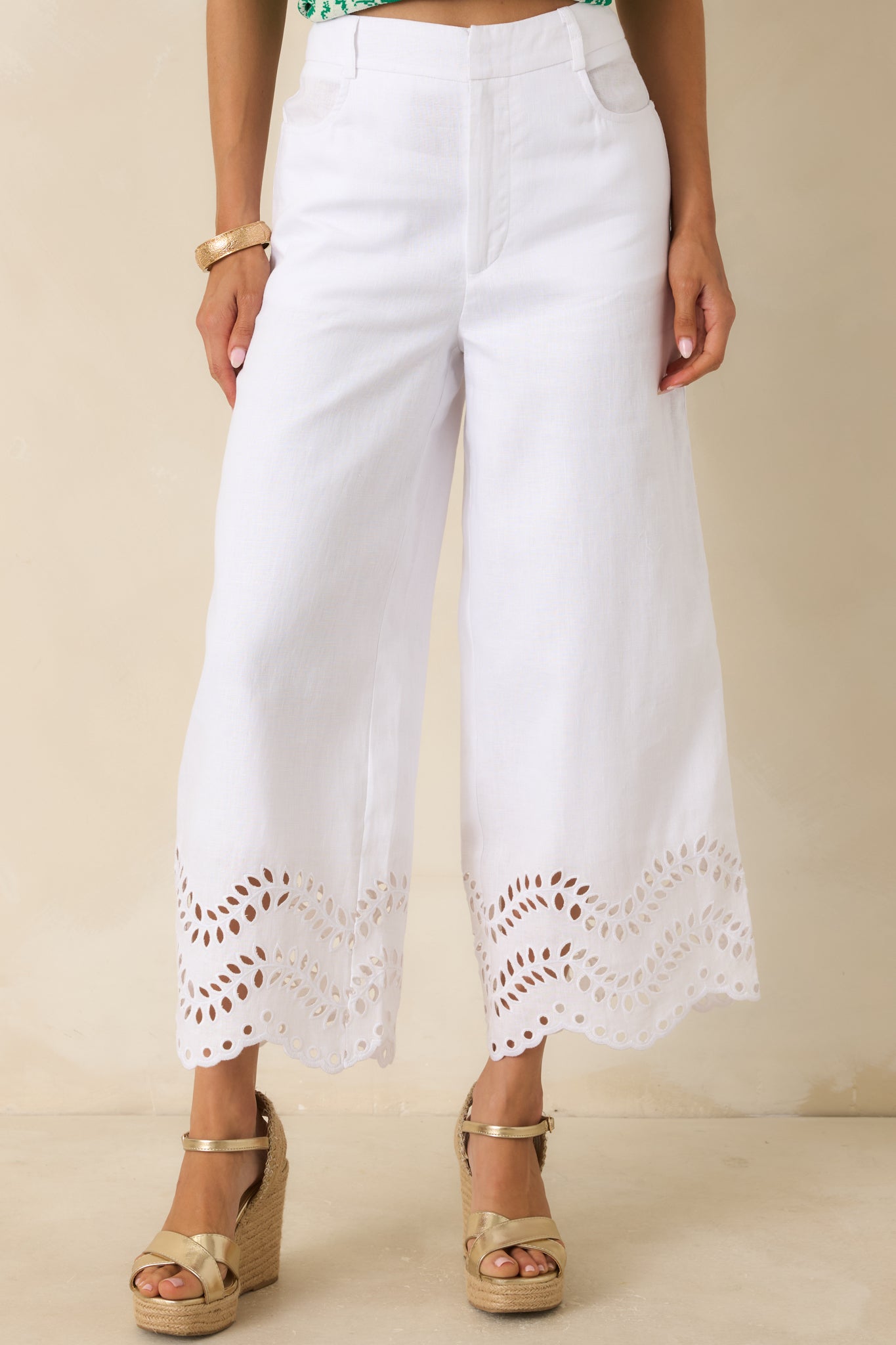 Detailed front view of the high-rise waistband and concealed front zipper closure.
