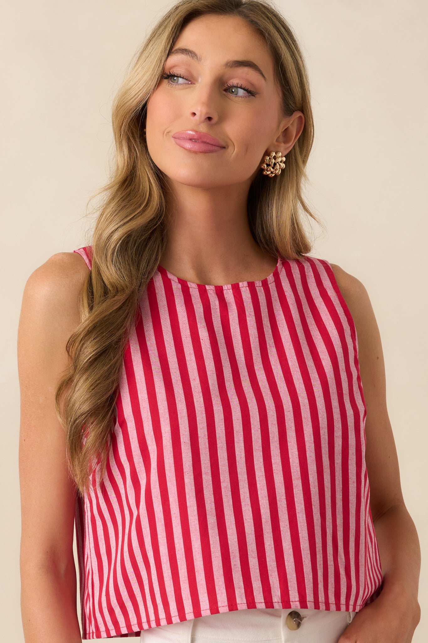 Cropped shot of the midsection, showing stripe alignment and fabric movement in the relaxed cut.