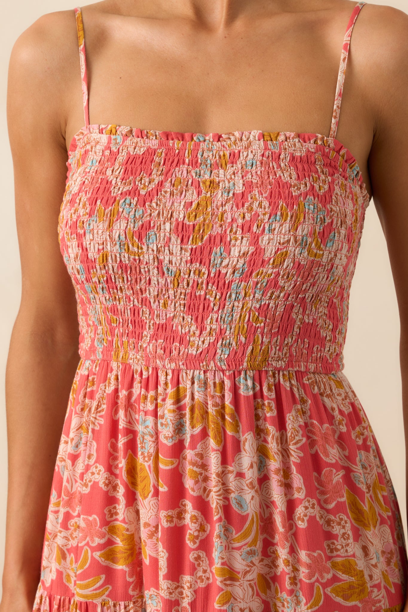 Close-up of the smocked bust area, showcasing the intricate texture and the soft rayon fabric.