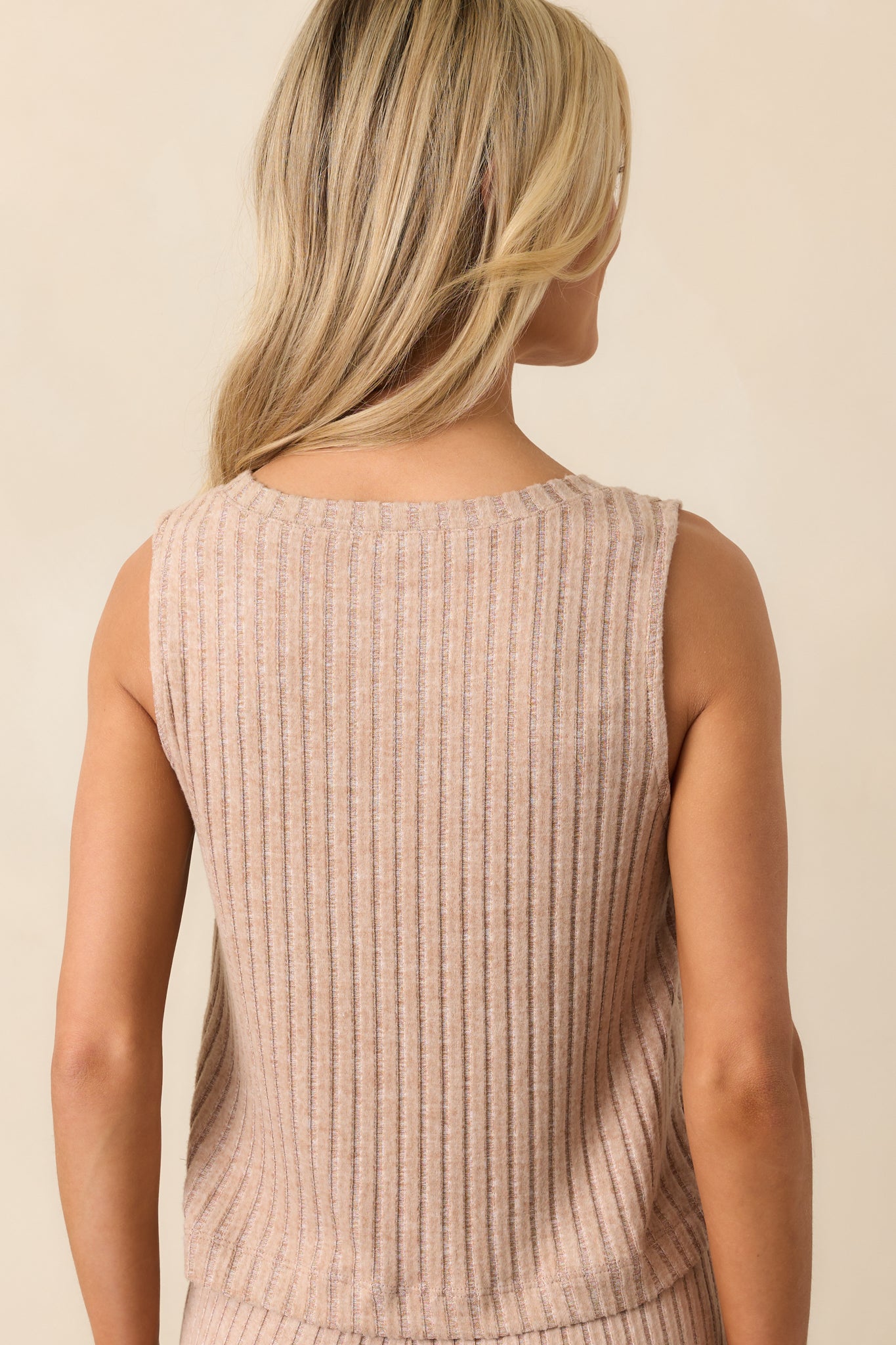 A back view of the coffee top displaying the smooth ribbed finish and full-coverage back with wide shoulder straps.