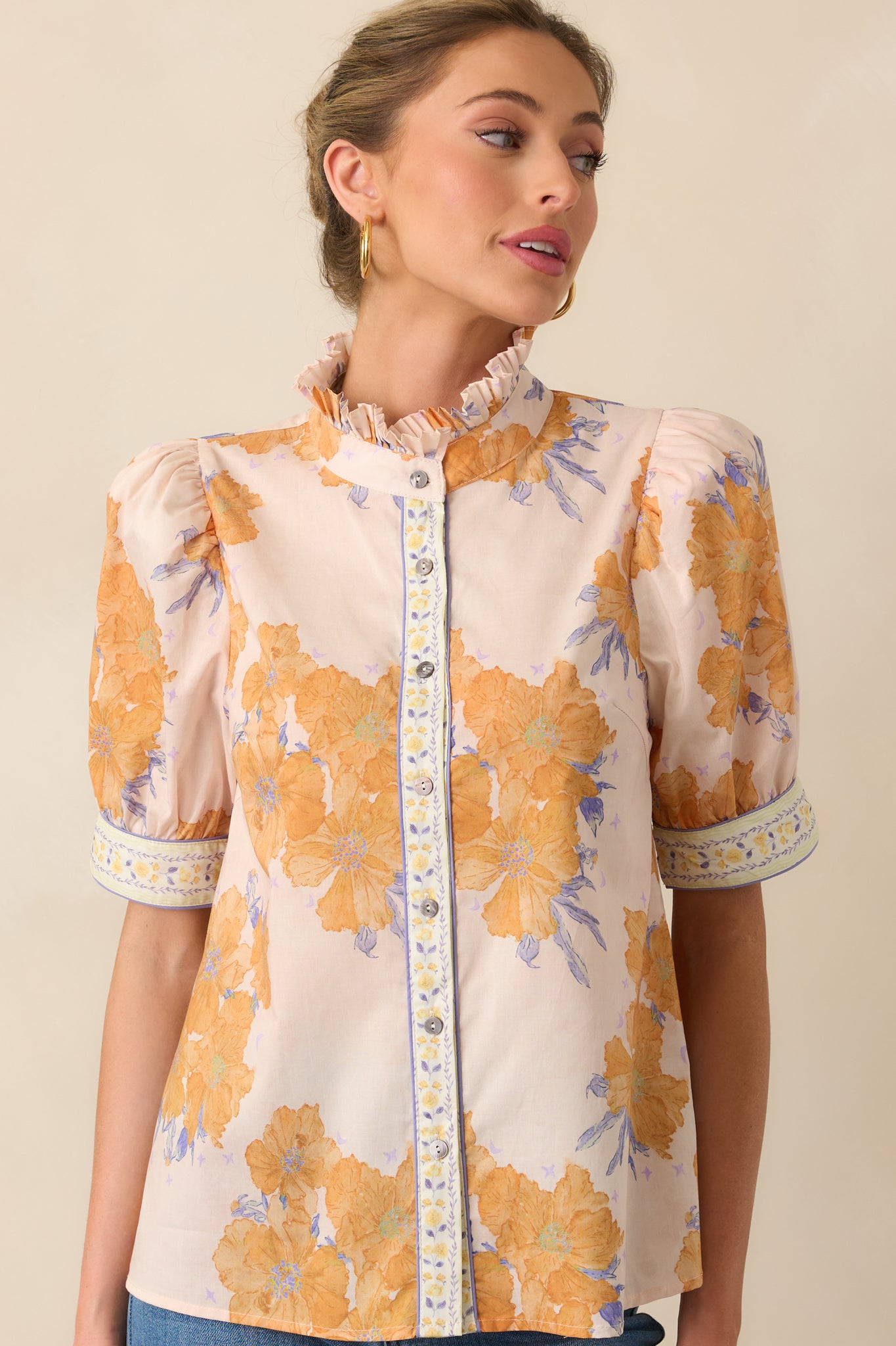 A detailed cropped view emphasizing the intricate floral pattern and texture of the honey yellow fabric.