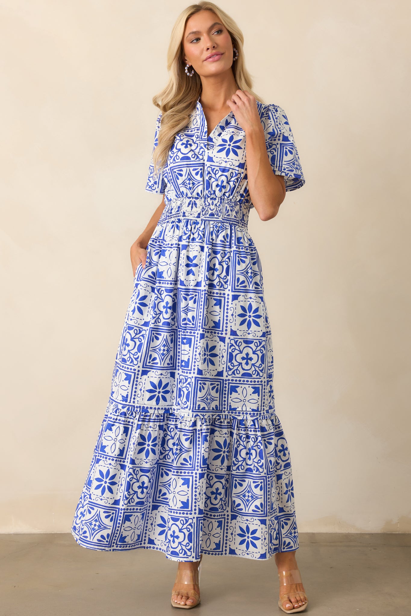 Front view of the dress showcasing the Sicilian tile print, notch v-neckline, and relaxed silhouette.